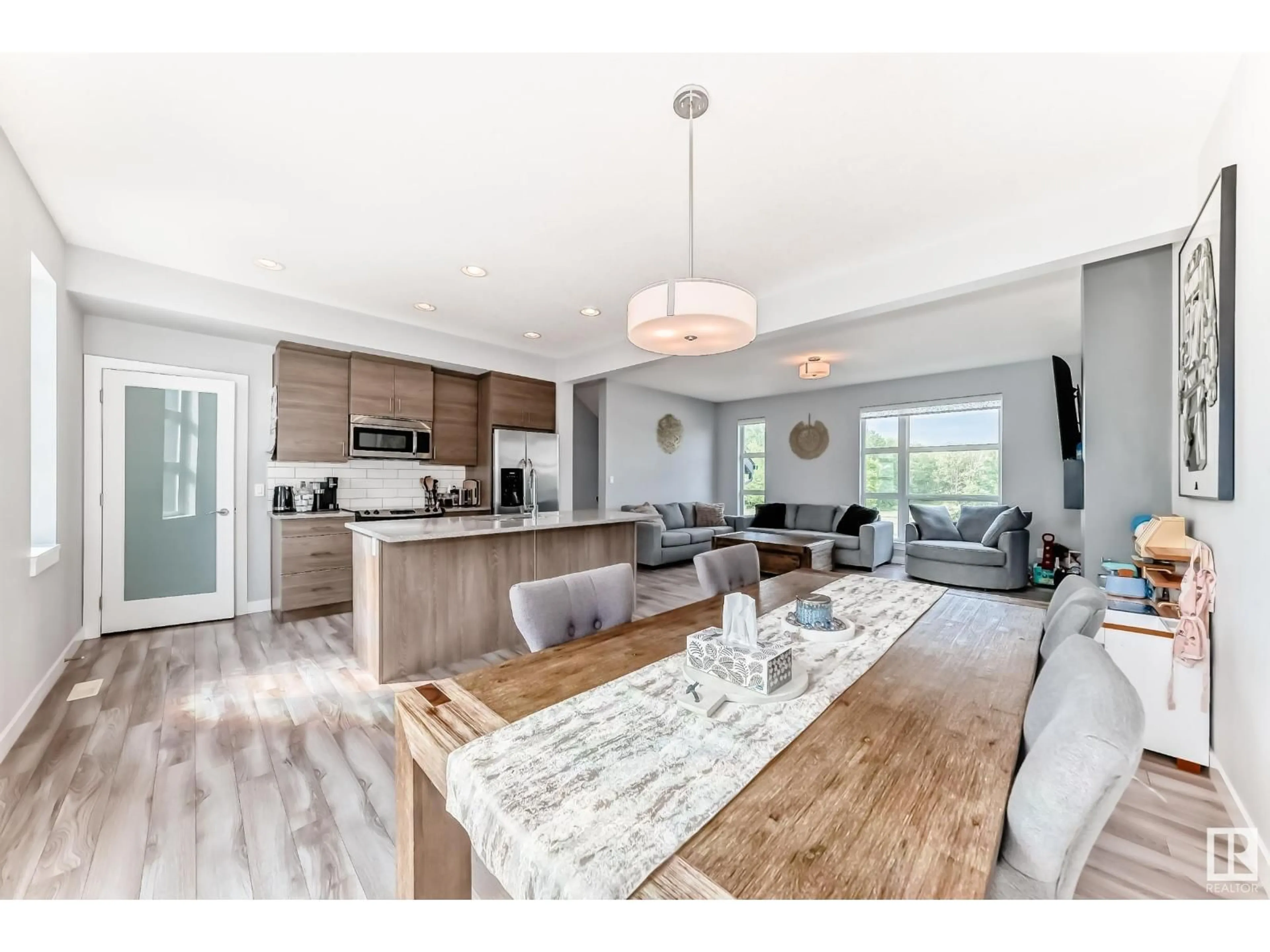 Open concept kitchen, wood/laminate floor for 14723 125 ST, Edmonton Alberta T5X0G8