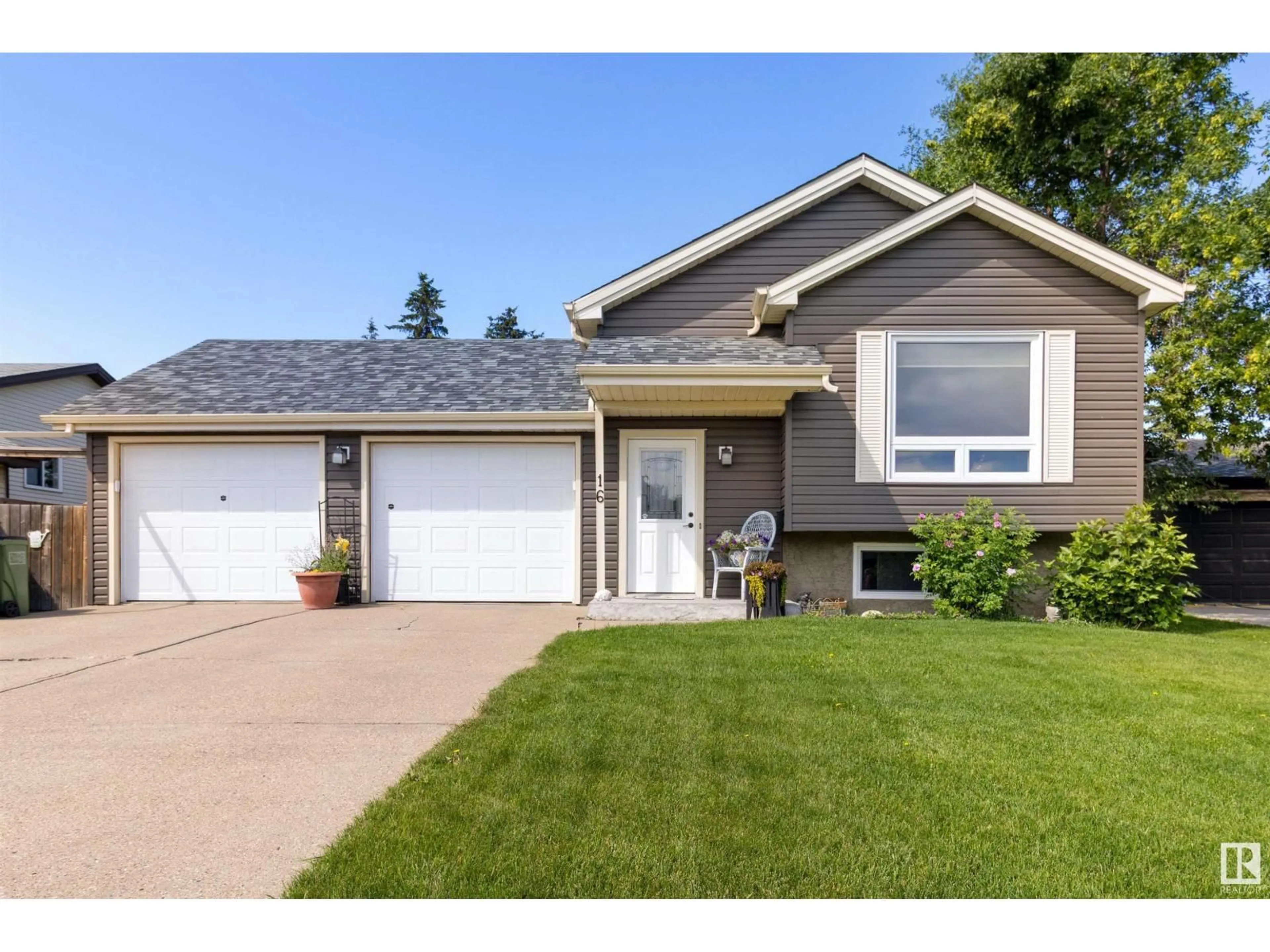 Home with vinyl exterior material, street for 16 HOWSON CR, Edmonton Alberta T5A4V2