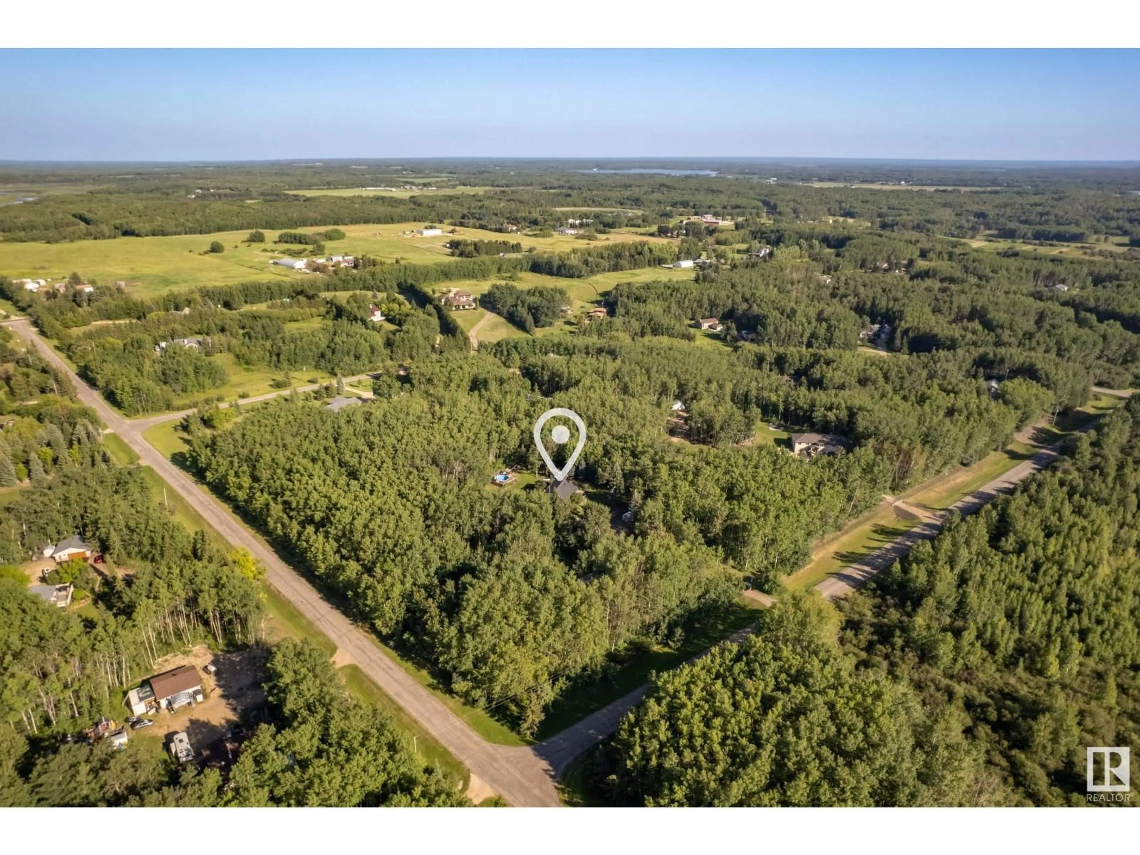 A pic from outside/outdoor area/front of a property/back of a property/a pic from drone, forest/trees view for 52510 - 145 RGE ROAD 213, Rural Strathcona County Alberta T8G2E6