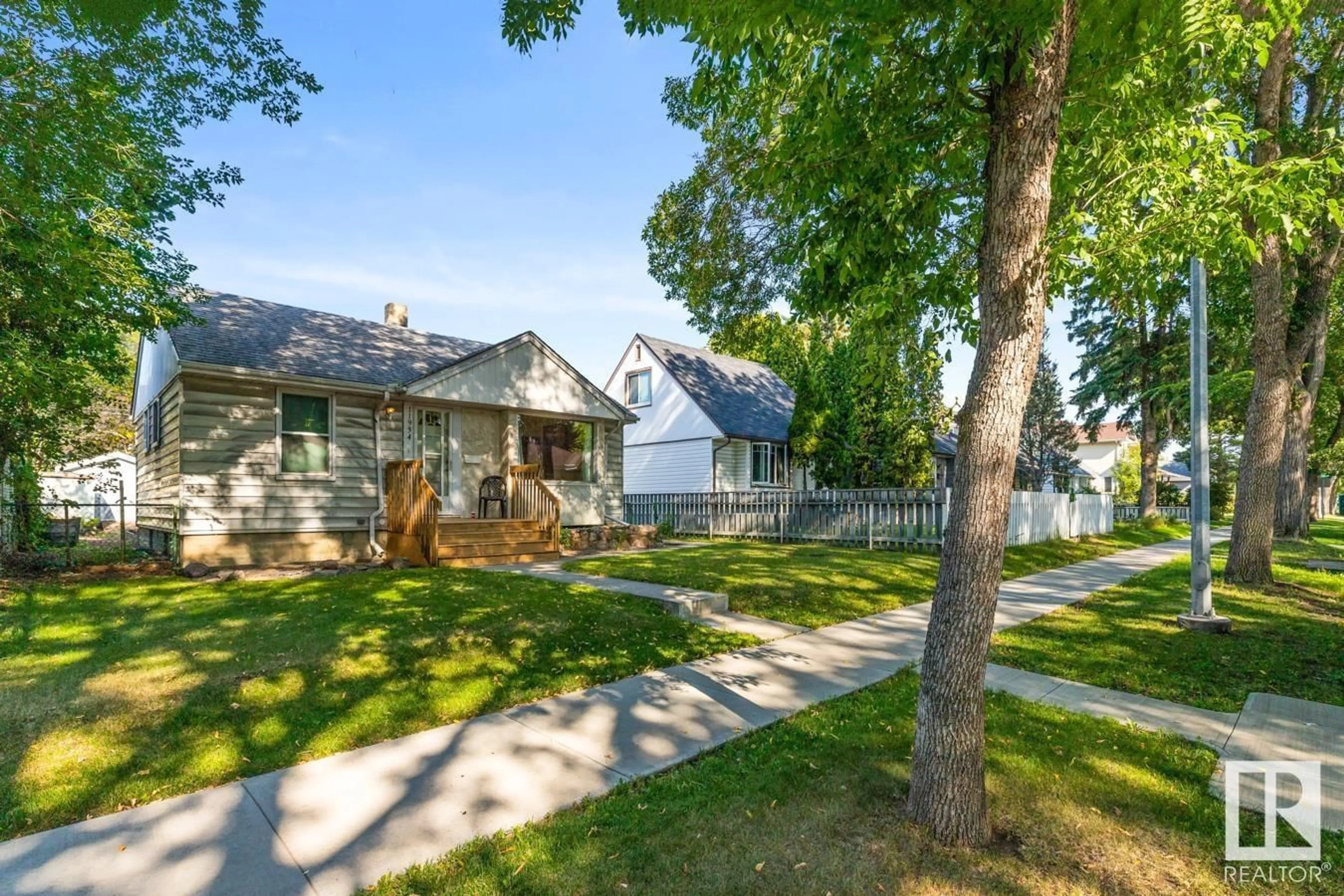 A pic from outside/outdoor area/front of a property/back of a property/a pic from drone, street for NW - 11934 58 ST, Edmonton Alberta T5W3W9
