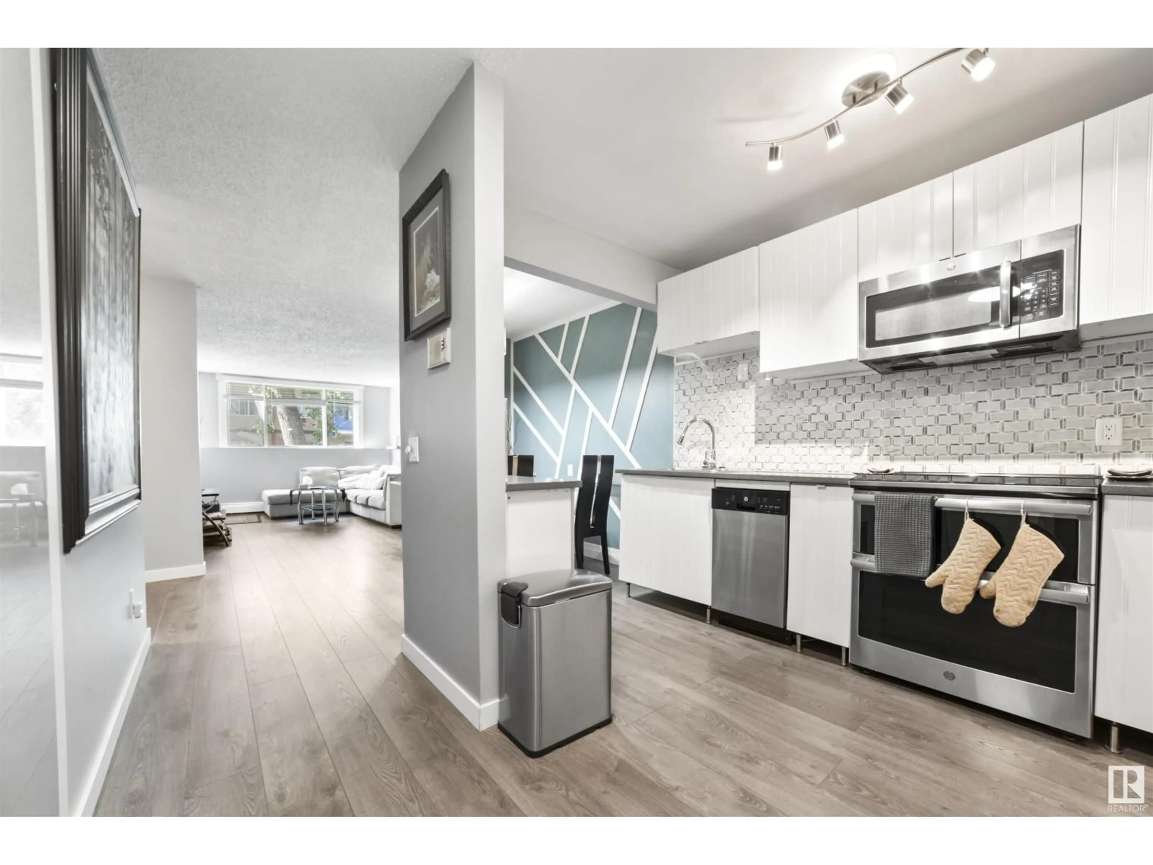 Open concept kitchen, unknown for #106 - 14908 26 ST, Edmonton Alberta T5Y2G4