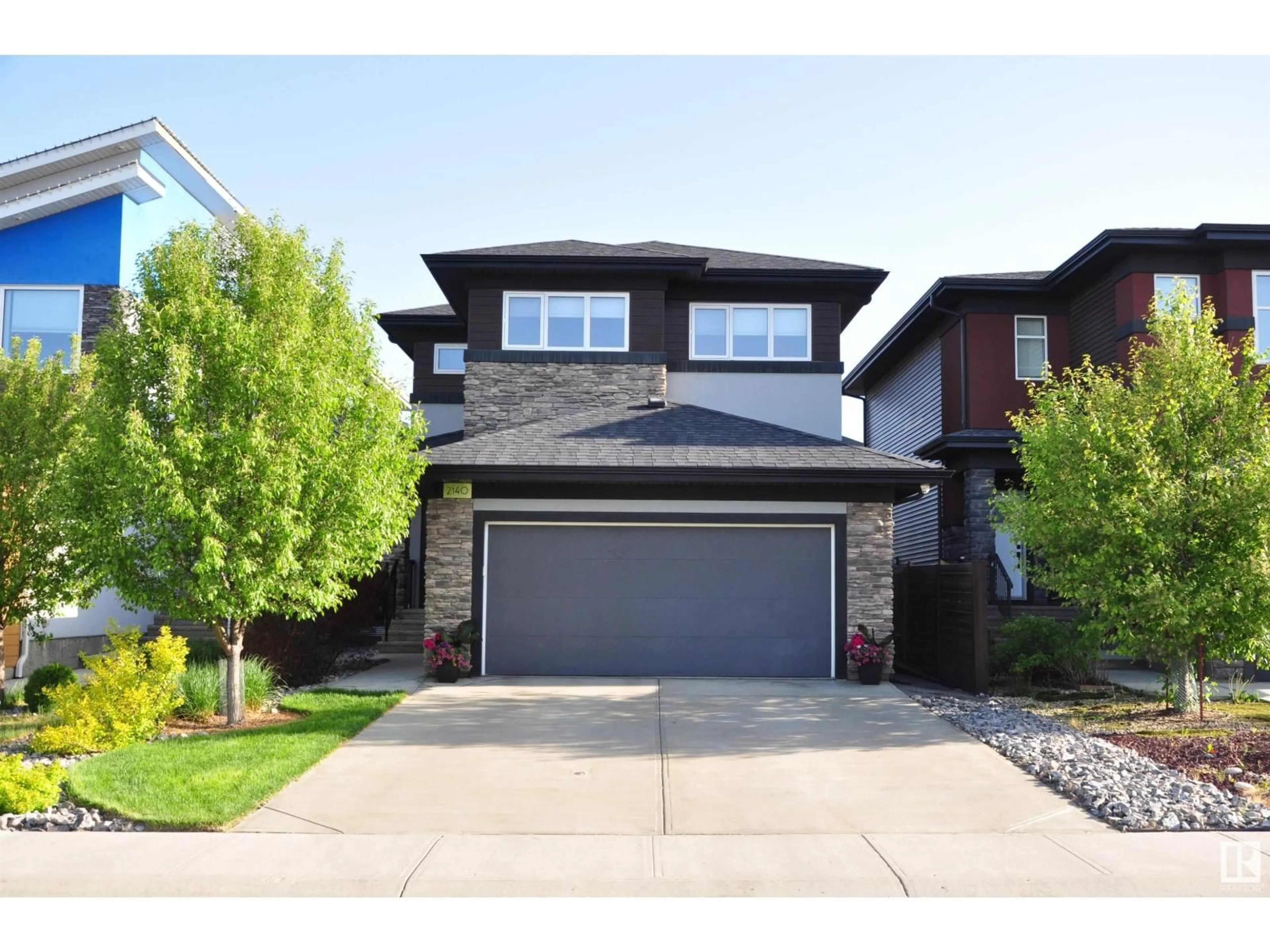 Home with brick exterior material, street for 2140 KOSHAL WY, Edmonton Alberta T6W3R9