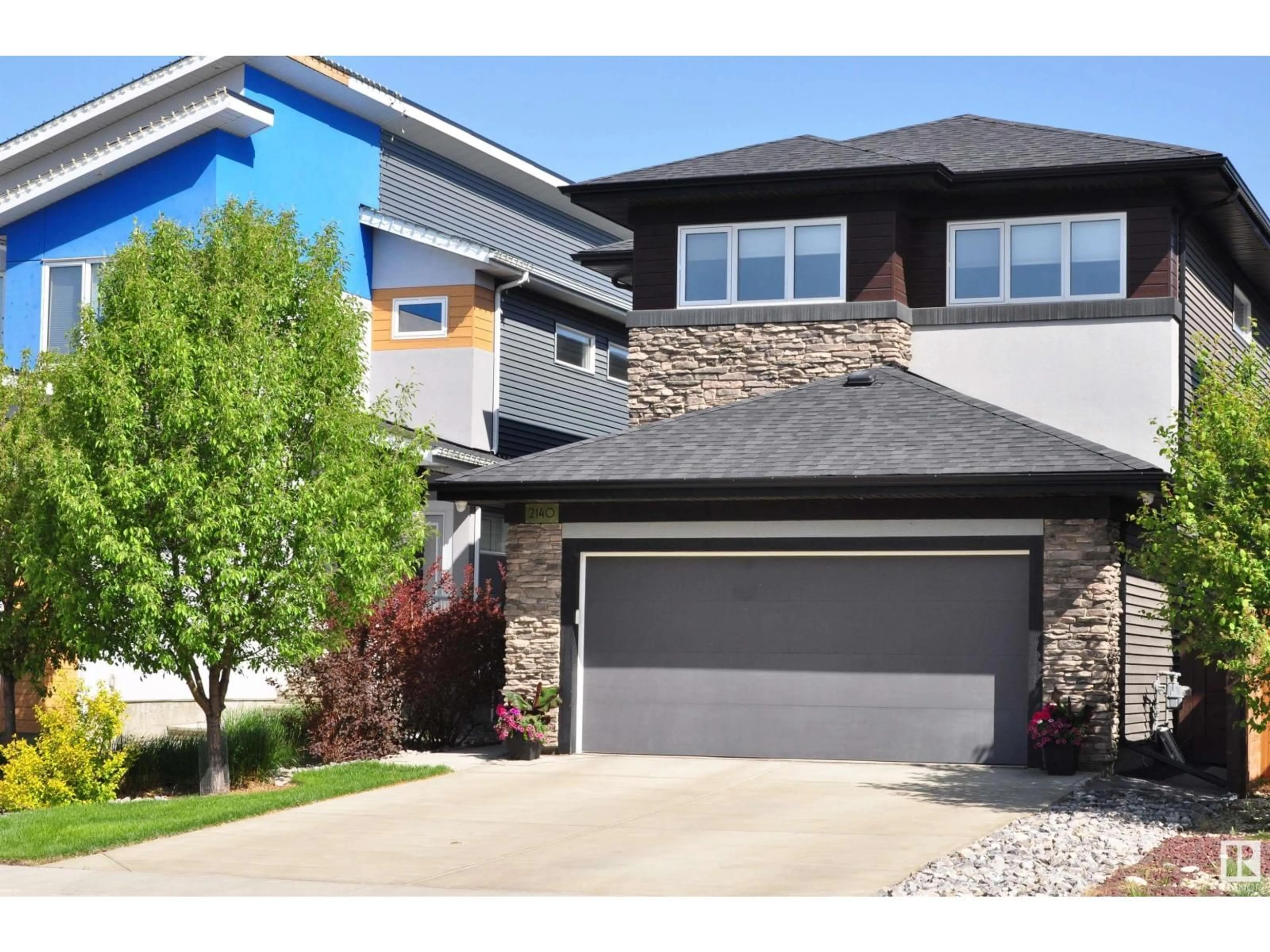 Home with vinyl exterior material, street for 2140 KOSHAL WY, Edmonton Alberta T6W3R9