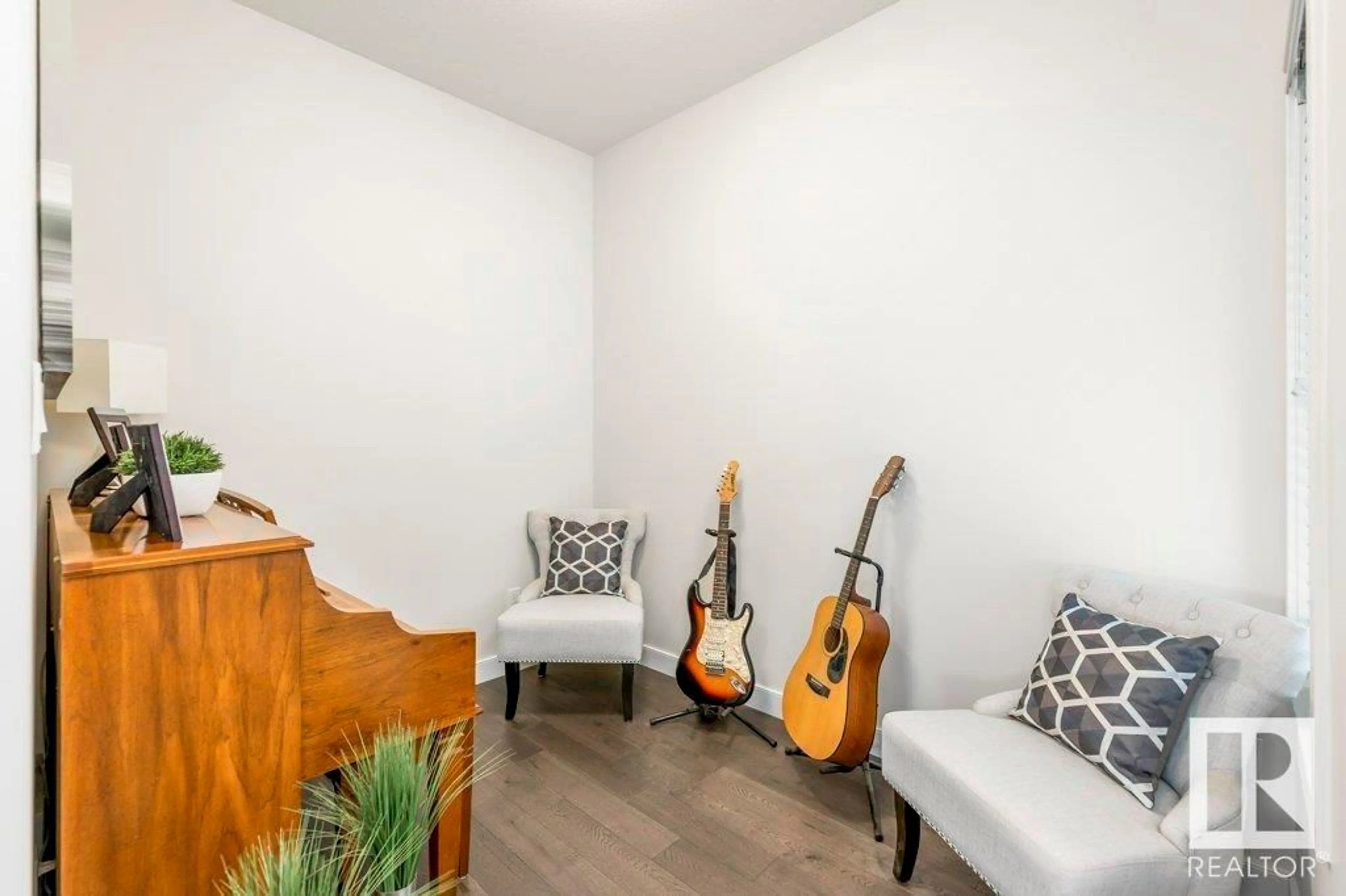 Living room with furniture, wood/laminate floor for 2140 KOSHAL WY, Edmonton Alberta T6W3R9