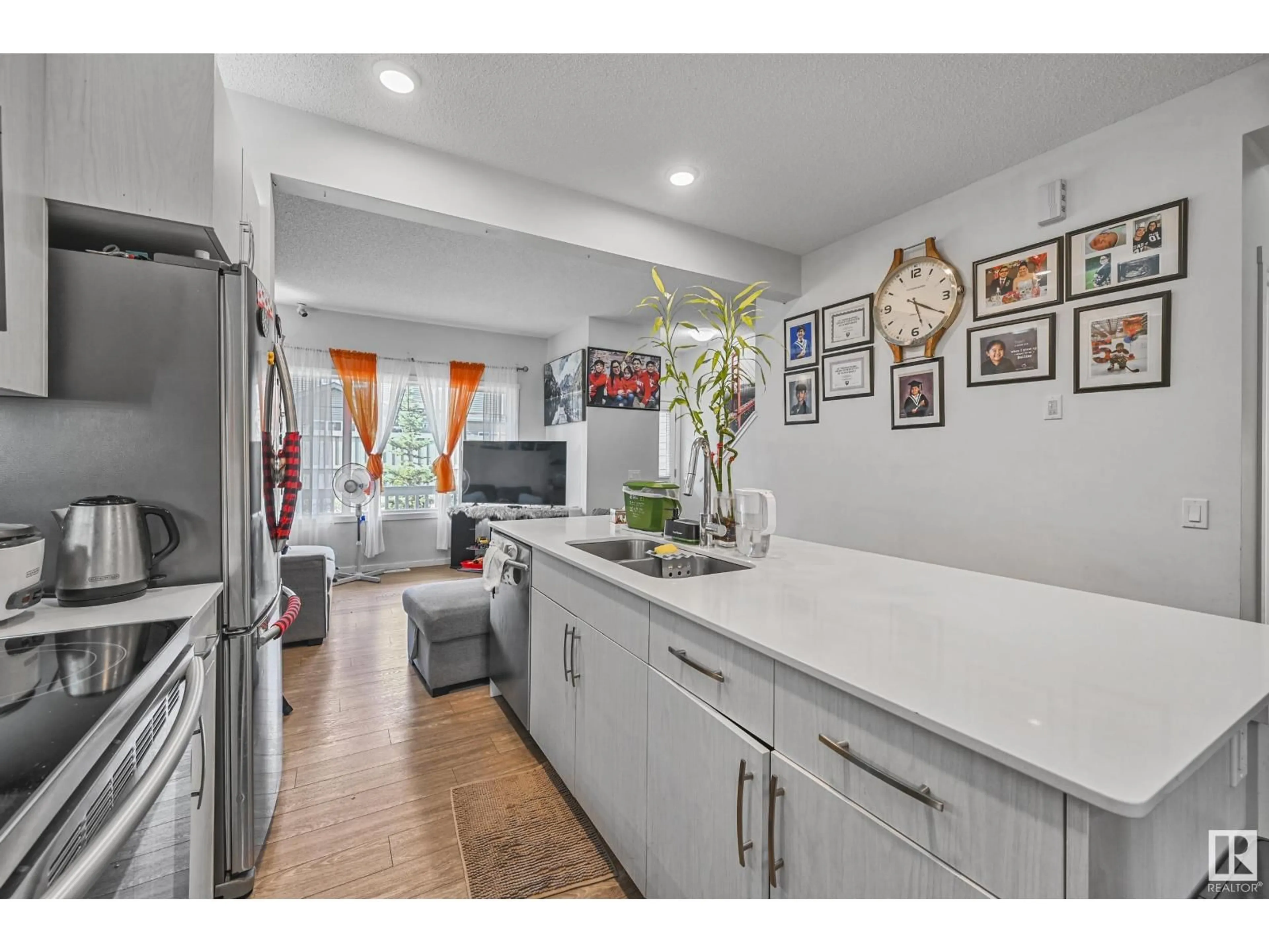 Open concept kitchen, ceramic/tile floor for #53 - 6004 ROSENTHAL WY, Edmonton Alberta T5T7L1
