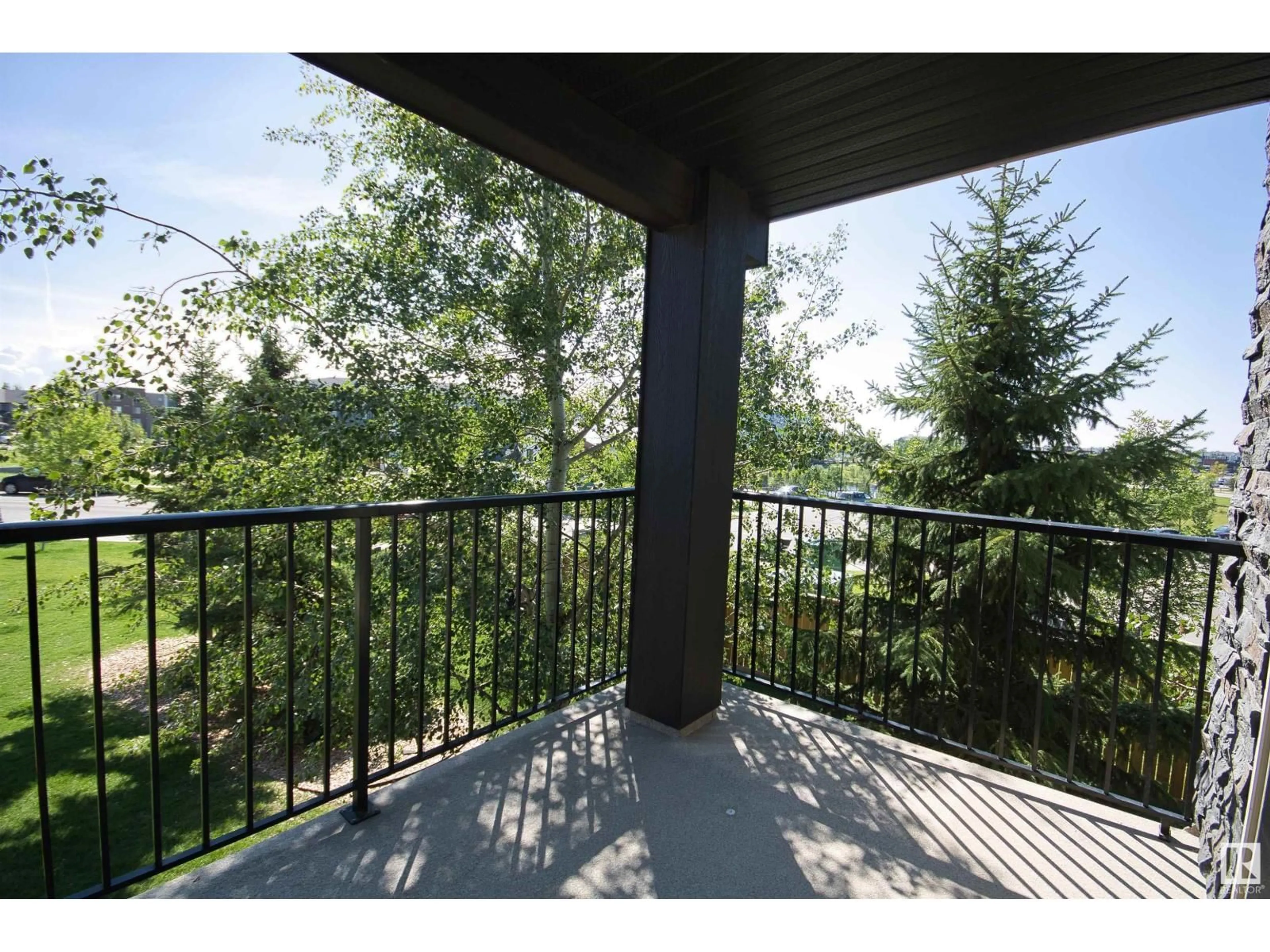 Patio, forest/trees view for 202 - 12035 22 AV, Edmonton Alberta T6W2X9