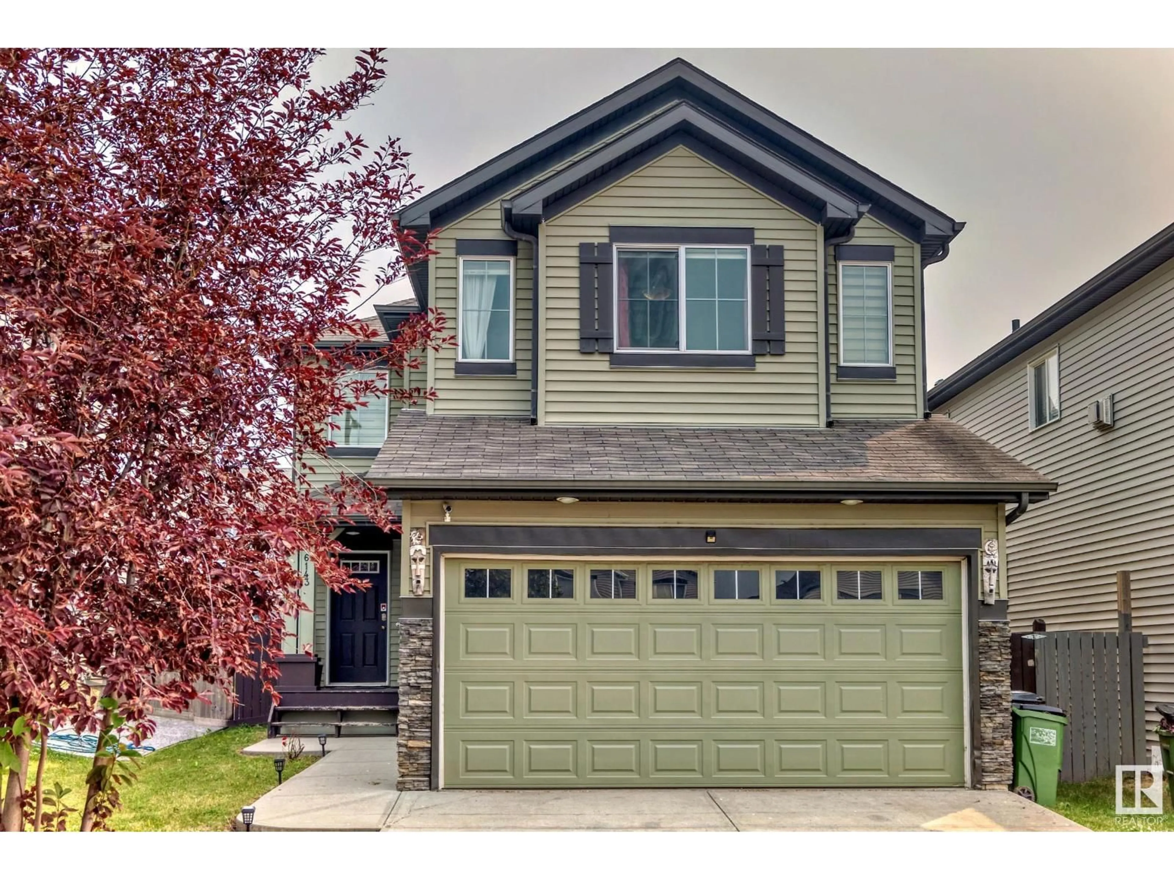 Home with vinyl exterior material, street for SW - 6143 12 AV, Edmonton Alberta T6X0M5