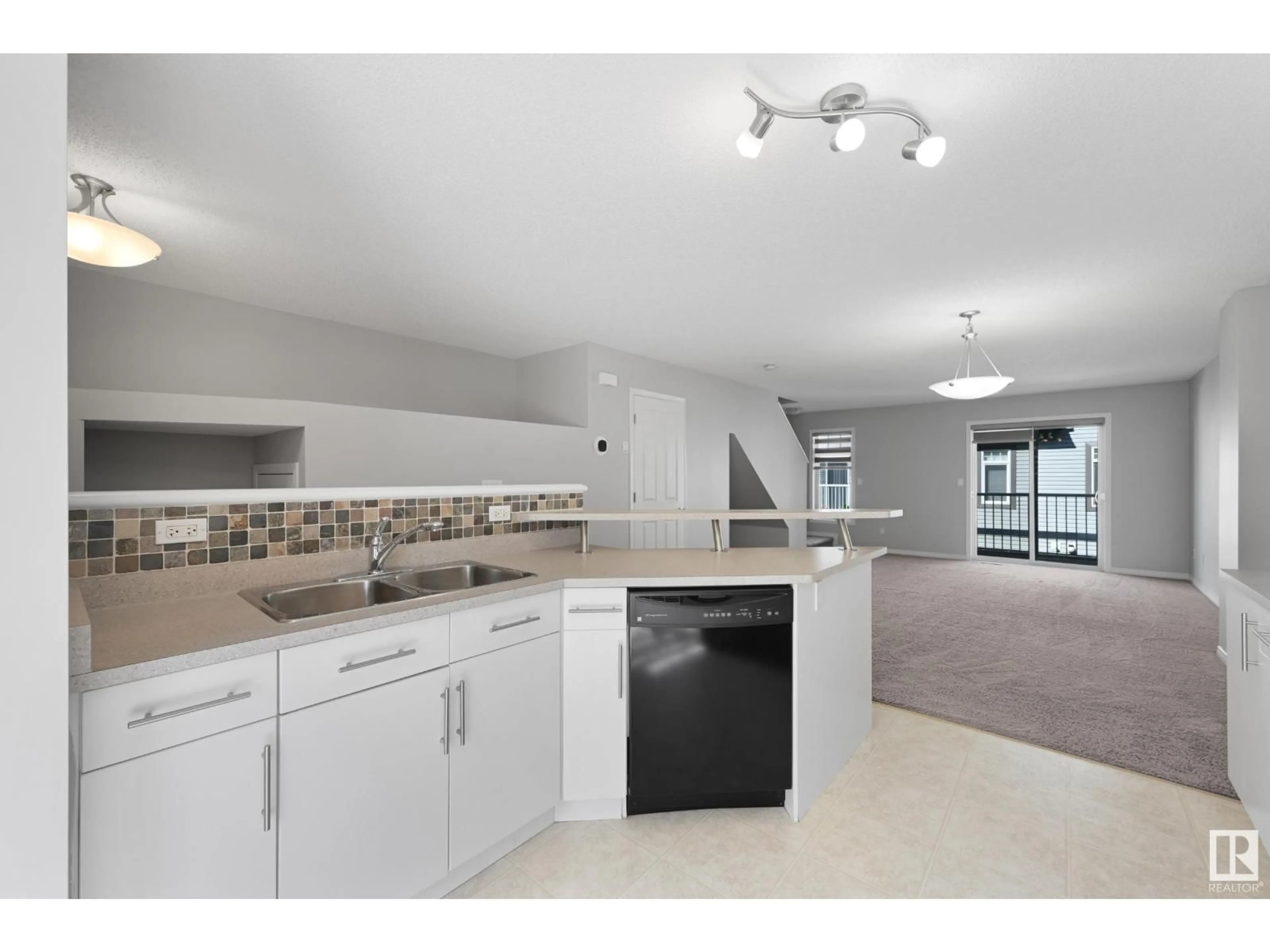 Open concept kitchen, ceramic/tile floor for #52 - 465 HEMINGWAY RD, Edmonton Alberta T6M0J7