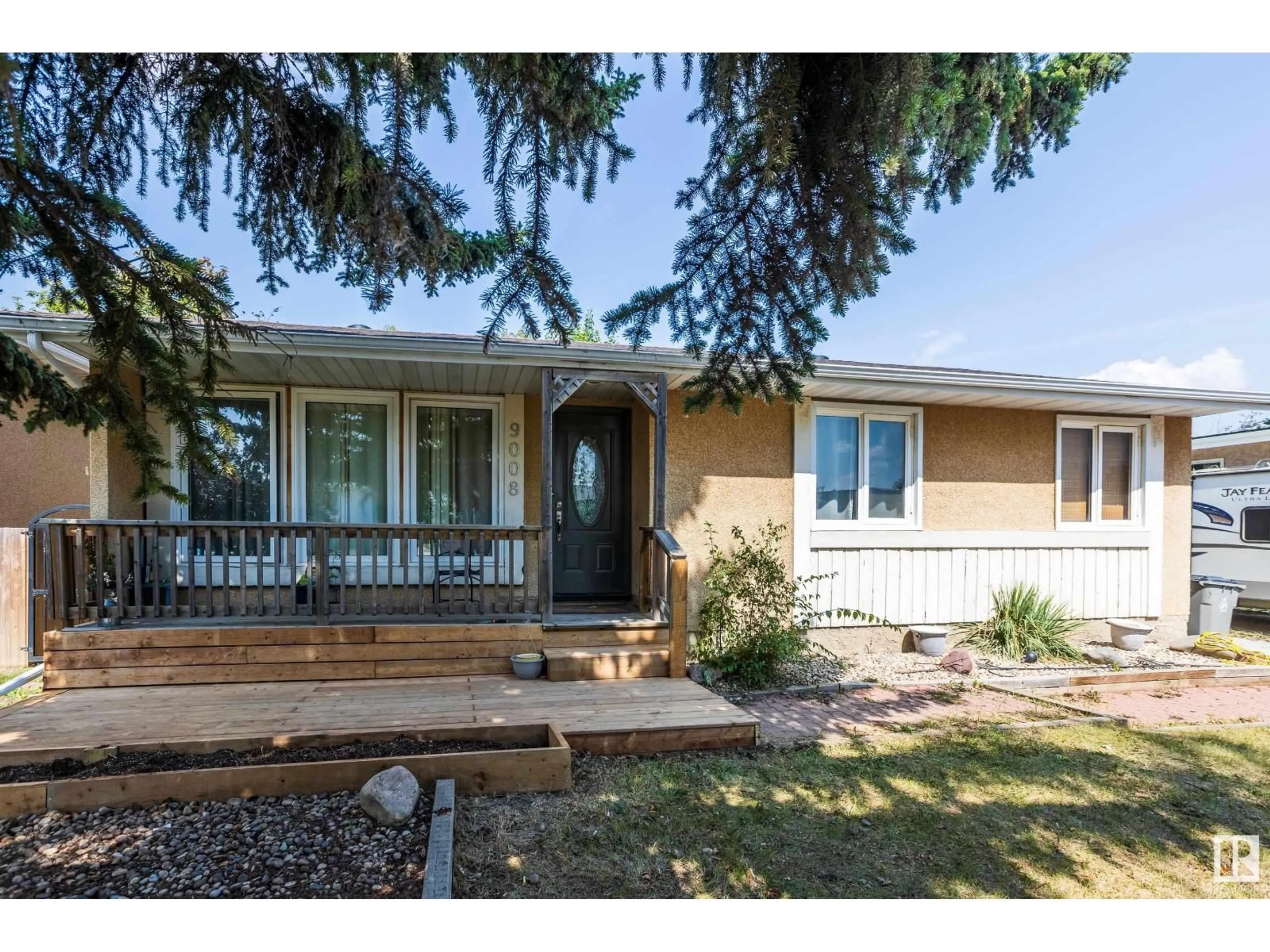Home with vinyl exterior material, street for 9008 99A AV, Morinville Alberta T8R1K3