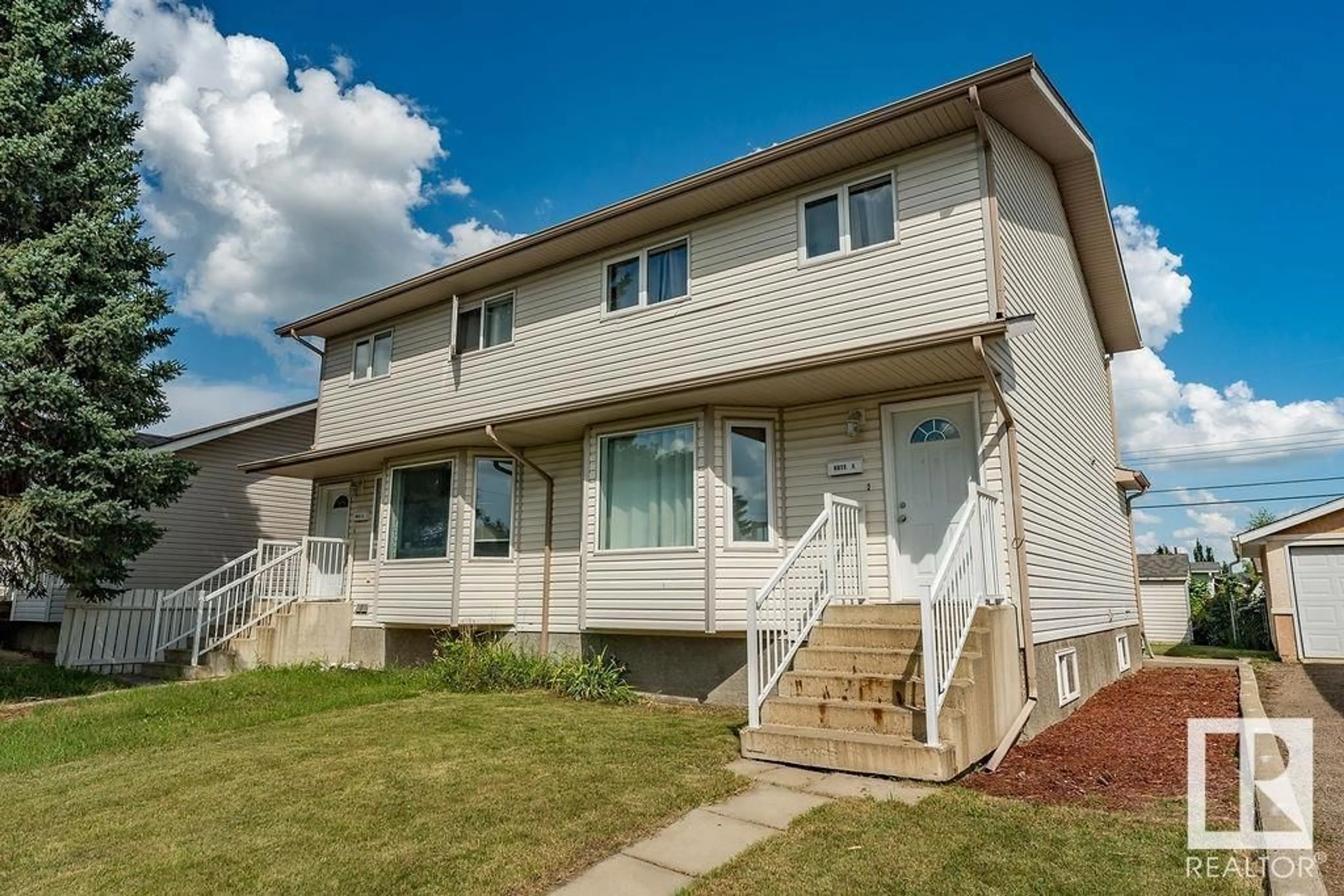 Home with vinyl exterior material, street for 4015 53 ST, Wetaskiwin Alberta T9A1P5