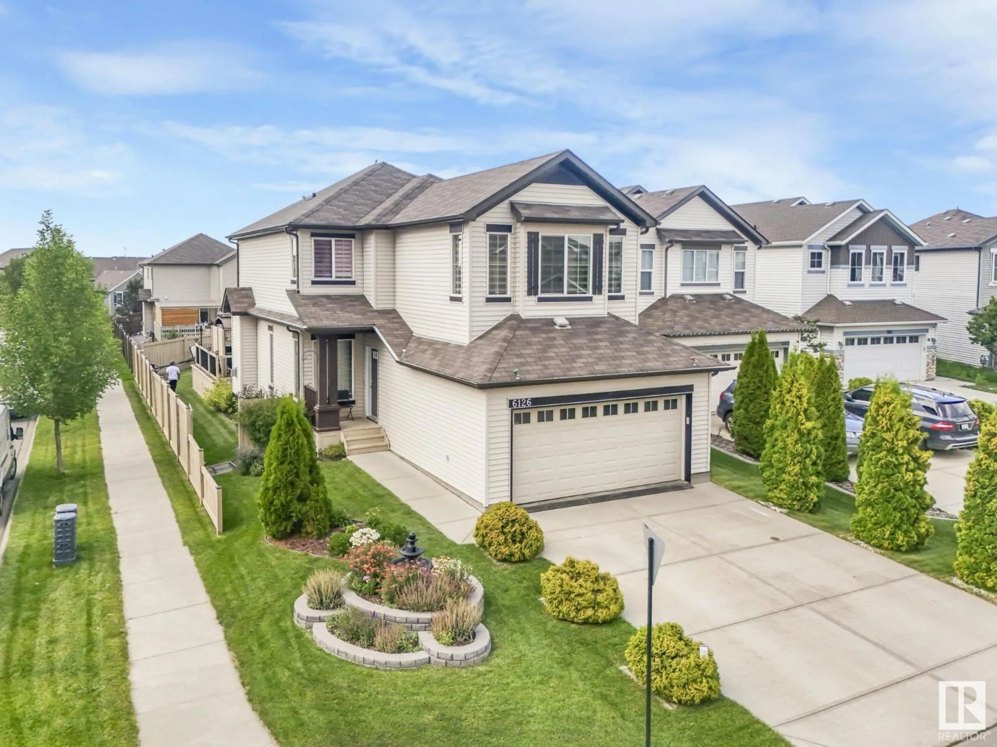A pic from outside/outdoor area/front of a property/back of a property/a pic from drone, street for SW - 6126 17A AV, Edmonton Alberta T6X0W2
