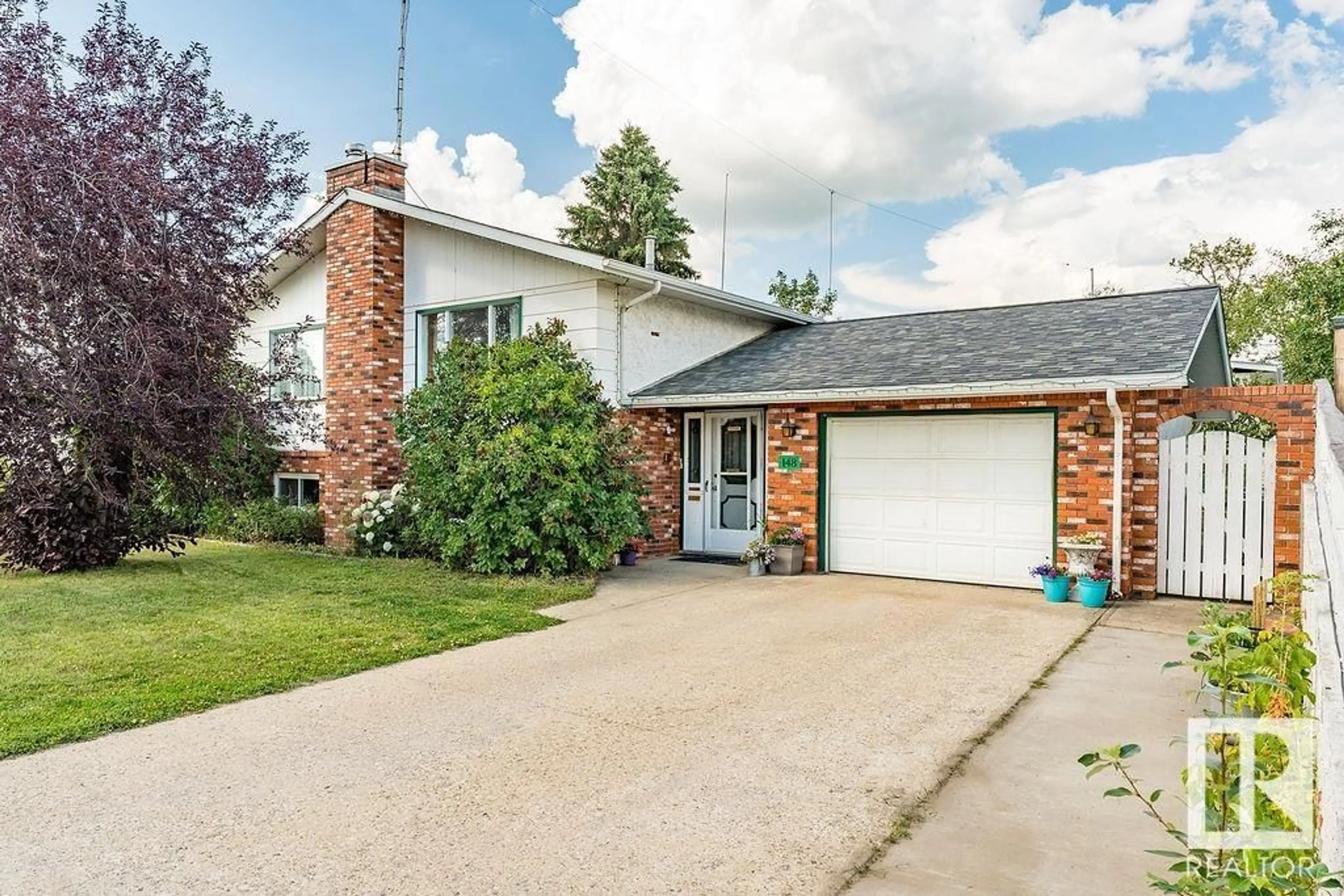 Home with brick exterior material, street for 148 WILLOW DR, Wetaskiwin Alberta T9A2W8
