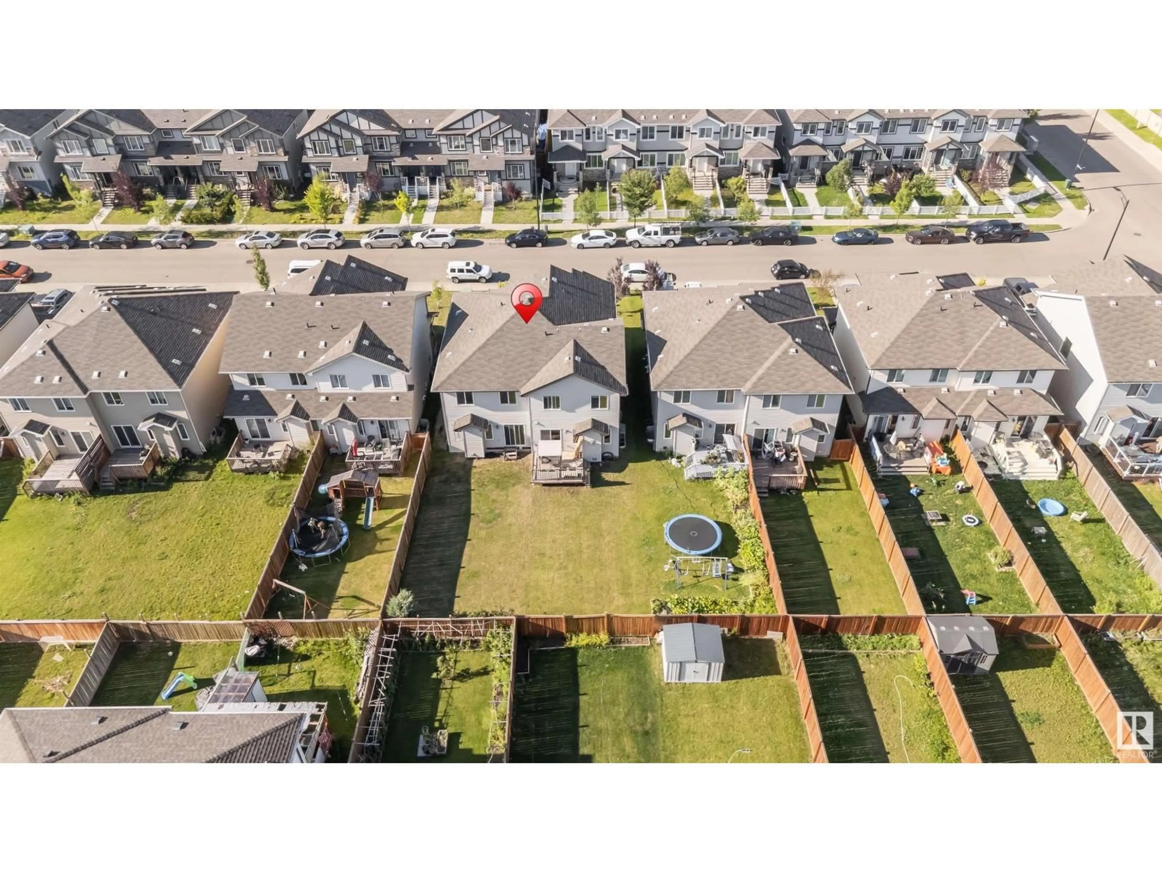 A pic from outside/outdoor area/front of a property/back of a property/a pic from drone, street for 1415 26 AV, Edmonton Alberta T6T0W1