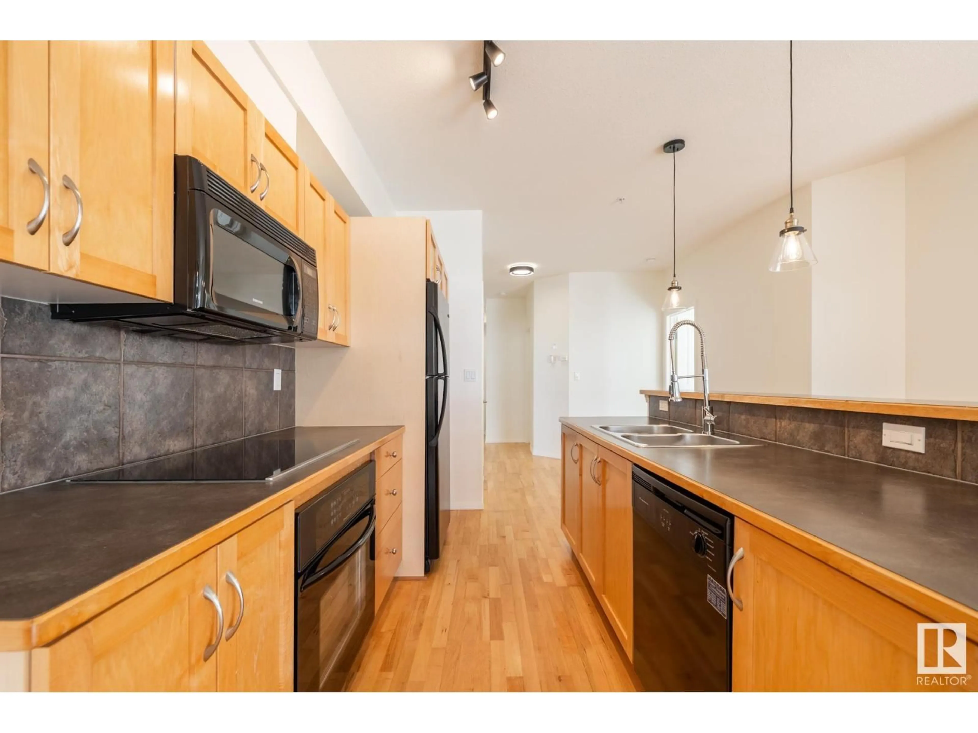 Open concept kitchen, unknown for #409 - 10503 98 AV, Edmonton Alberta T5K0B2