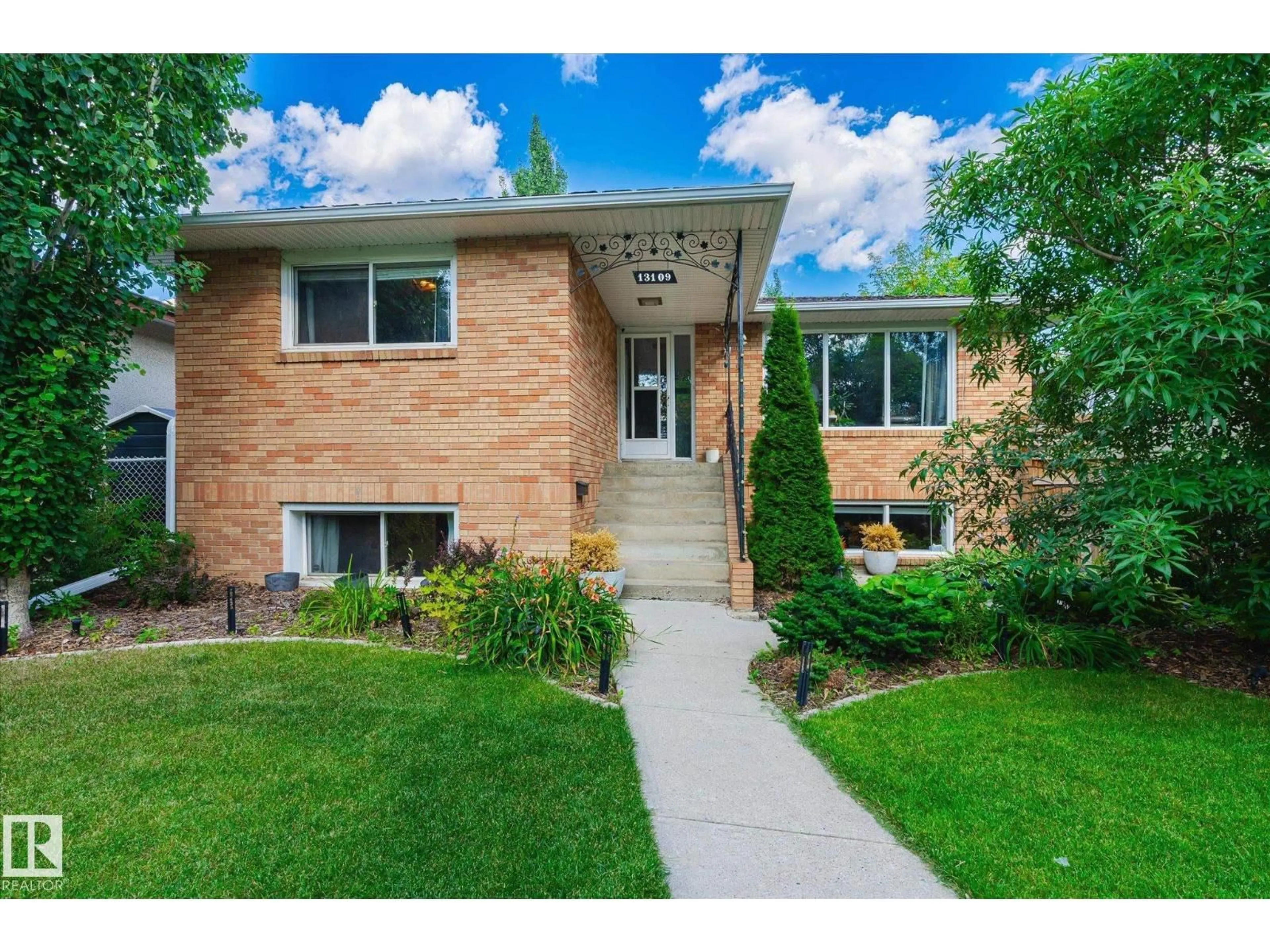 Home with brick exterior material, street for 13107 102 ST, Edmonton Alberta T5E4J6