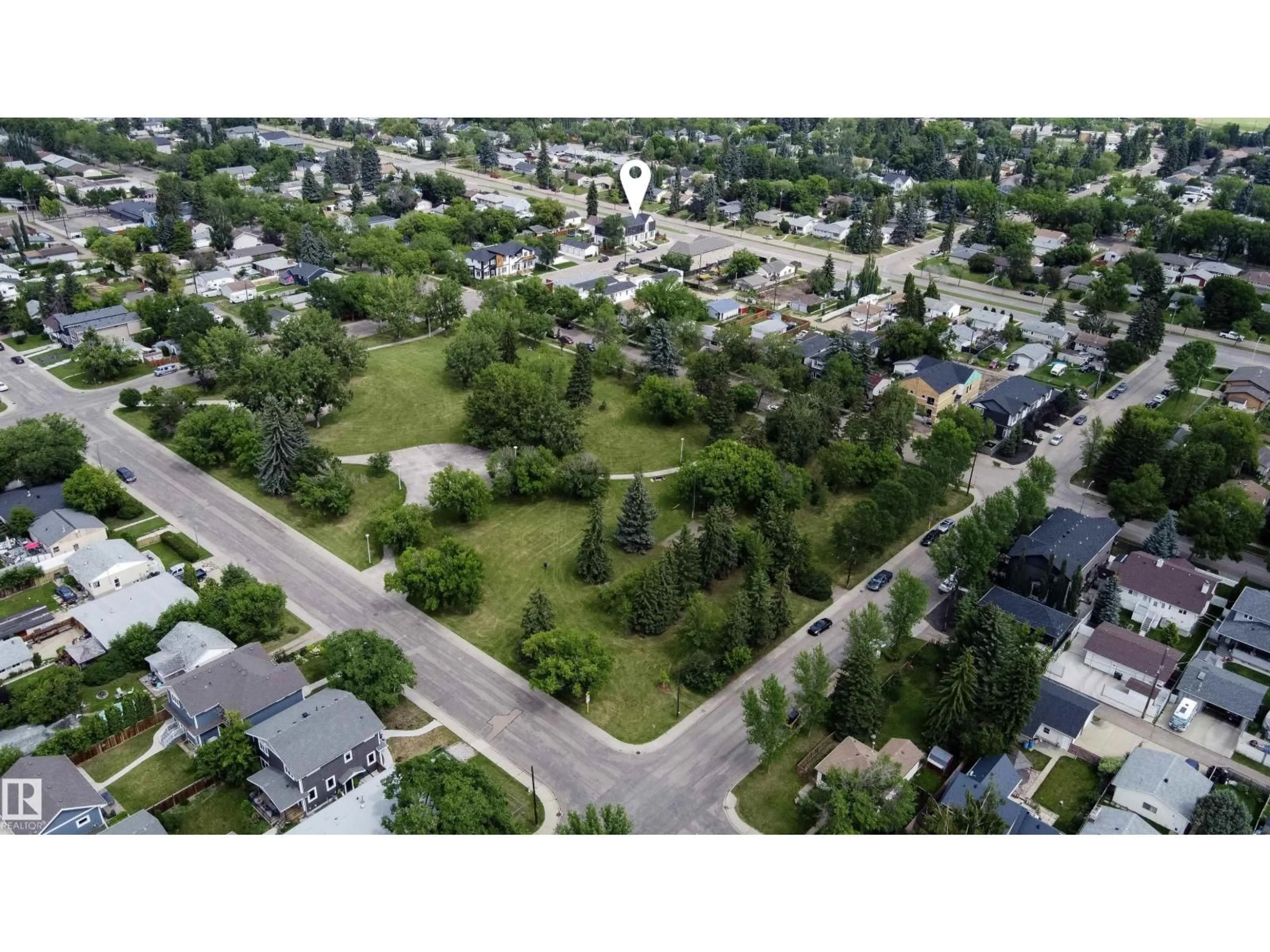 A pic from outside/outdoor area/front of a property/back of a property/a pic from drone, street for 14904 109 AV, Edmonton Alberta T5P1M6