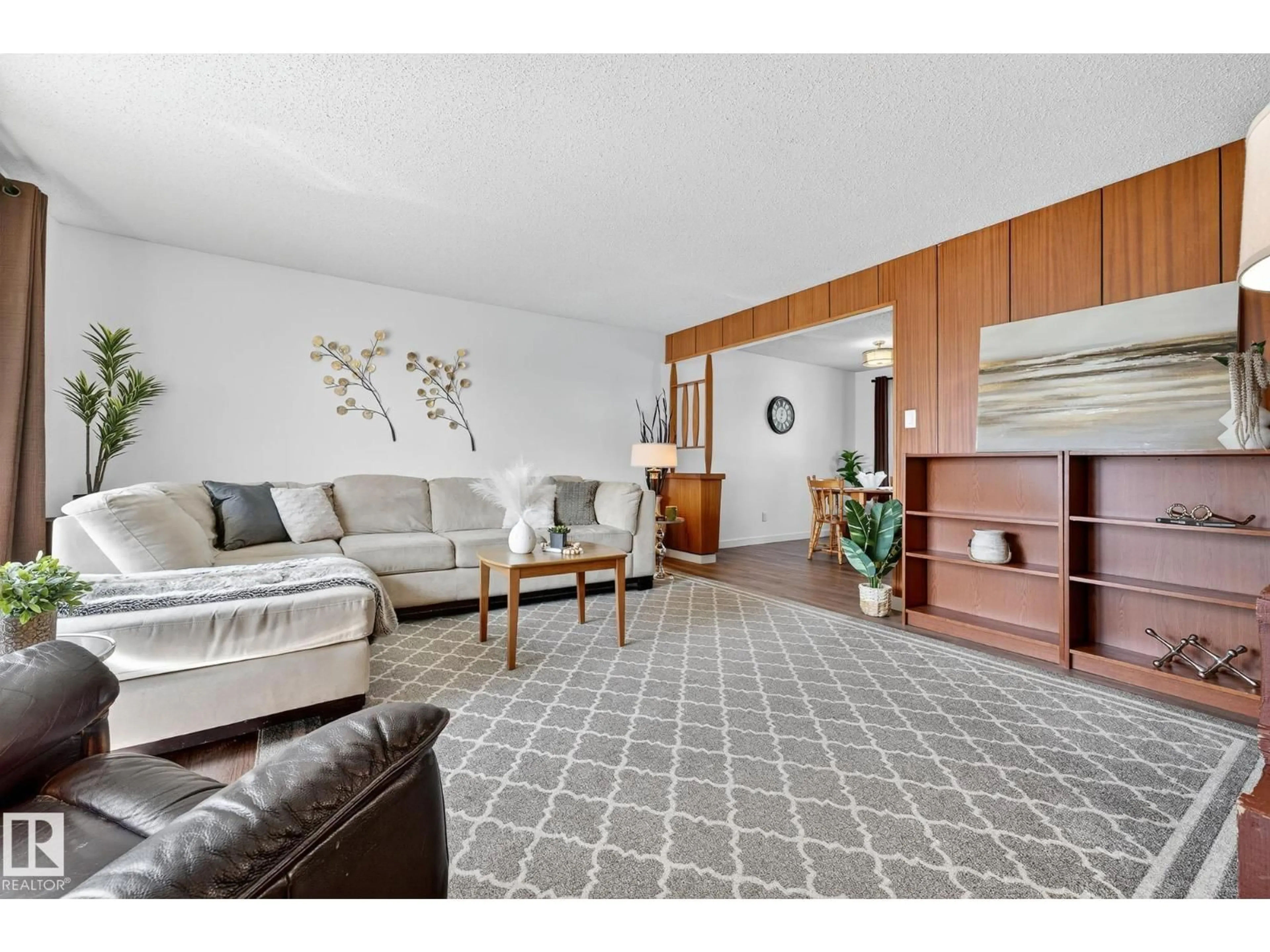 Living room with furniture, unknown for 5516 140A AV, Edmonton Alberta T5A1H3
