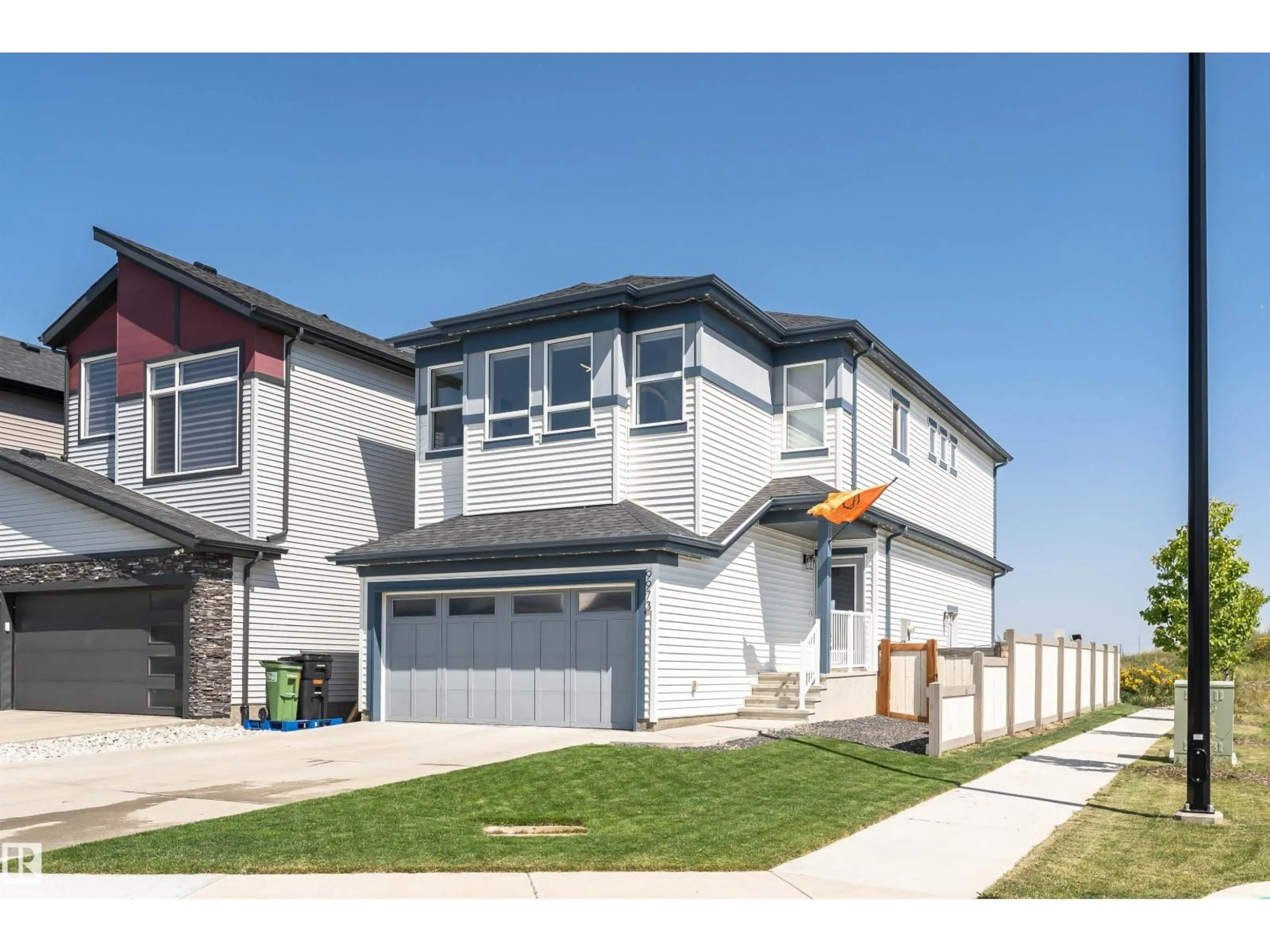 Home with vinyl exterior material, street for NW - 9973 205A ST, Edmonton Alberta T5T7N4