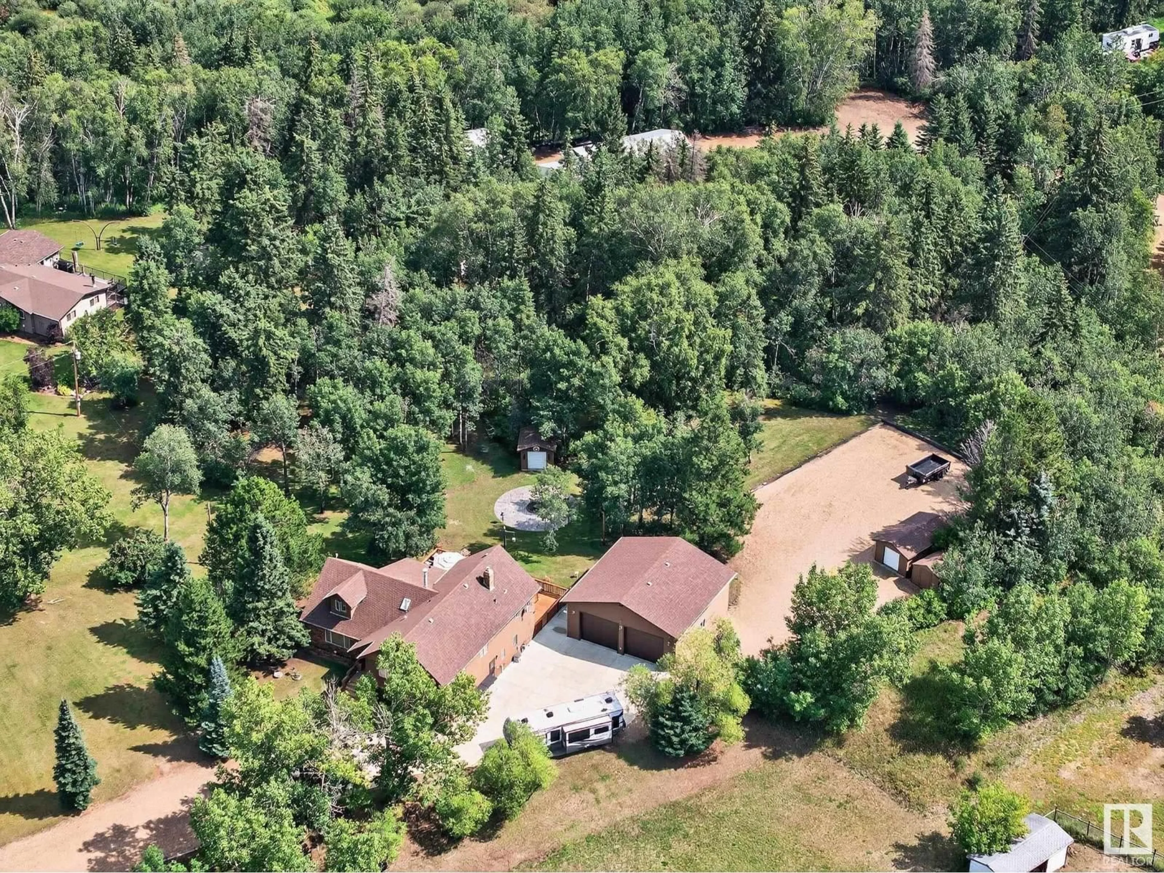 A pic from outside/outdoor area/front of a property/back of a property/a pic from drone, forest/trees view for 55 473084 RGE ROAD 242, Rural Wetaskiwin County Alberta T0C1Z0