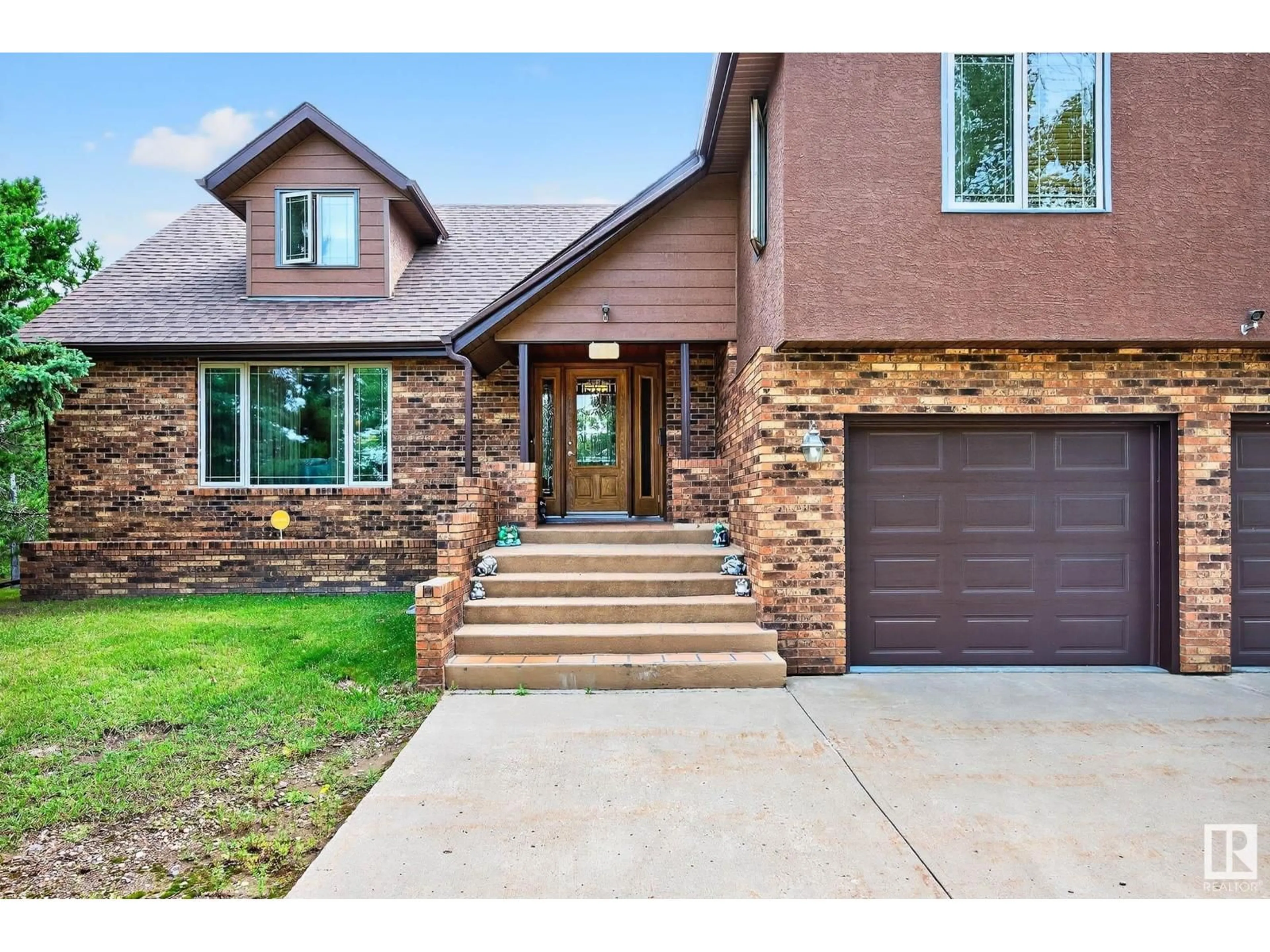 Home with brick exterior material, street for 55 473084 RGE ROAD 242, Rural Wetaskiwin County Alberta T0C1Z0