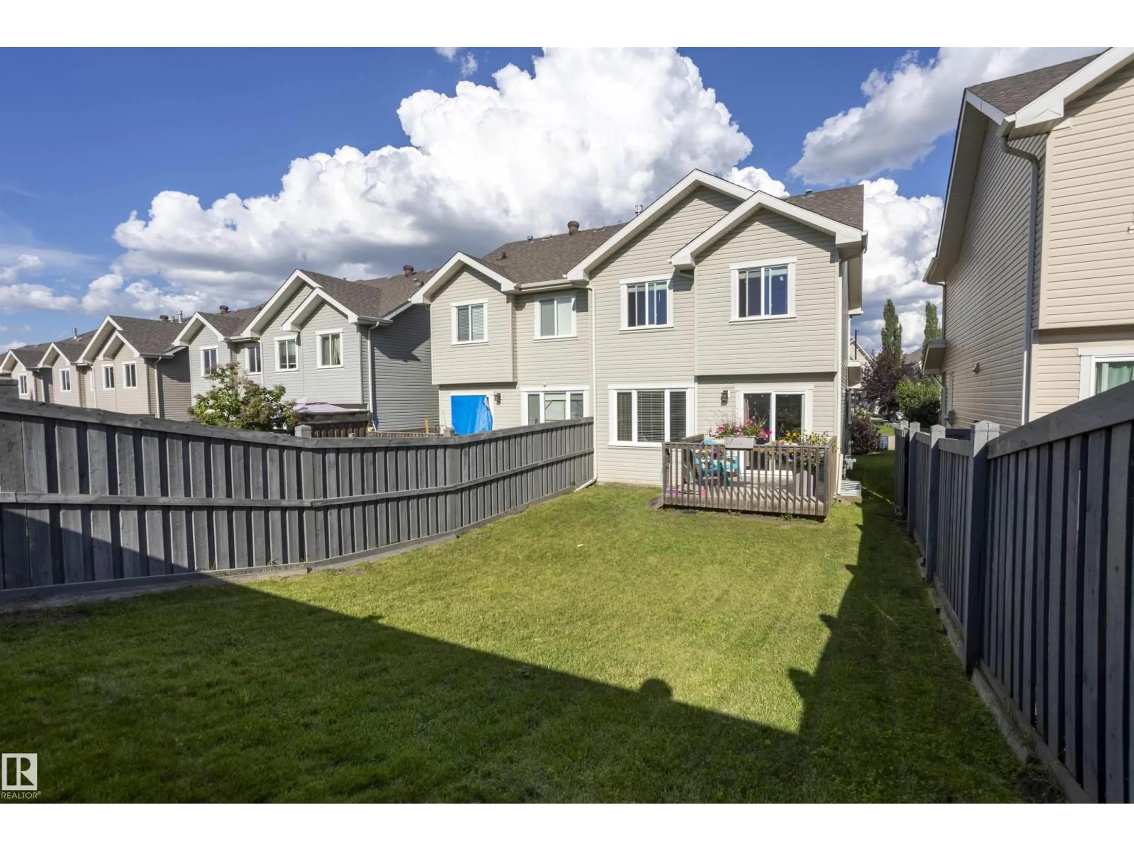 A pic from outside/outdoor area/front of a property/back of a property/a pic from drone, mountain view for 4932 214 ST, Edmonton Alberta T6M0K6