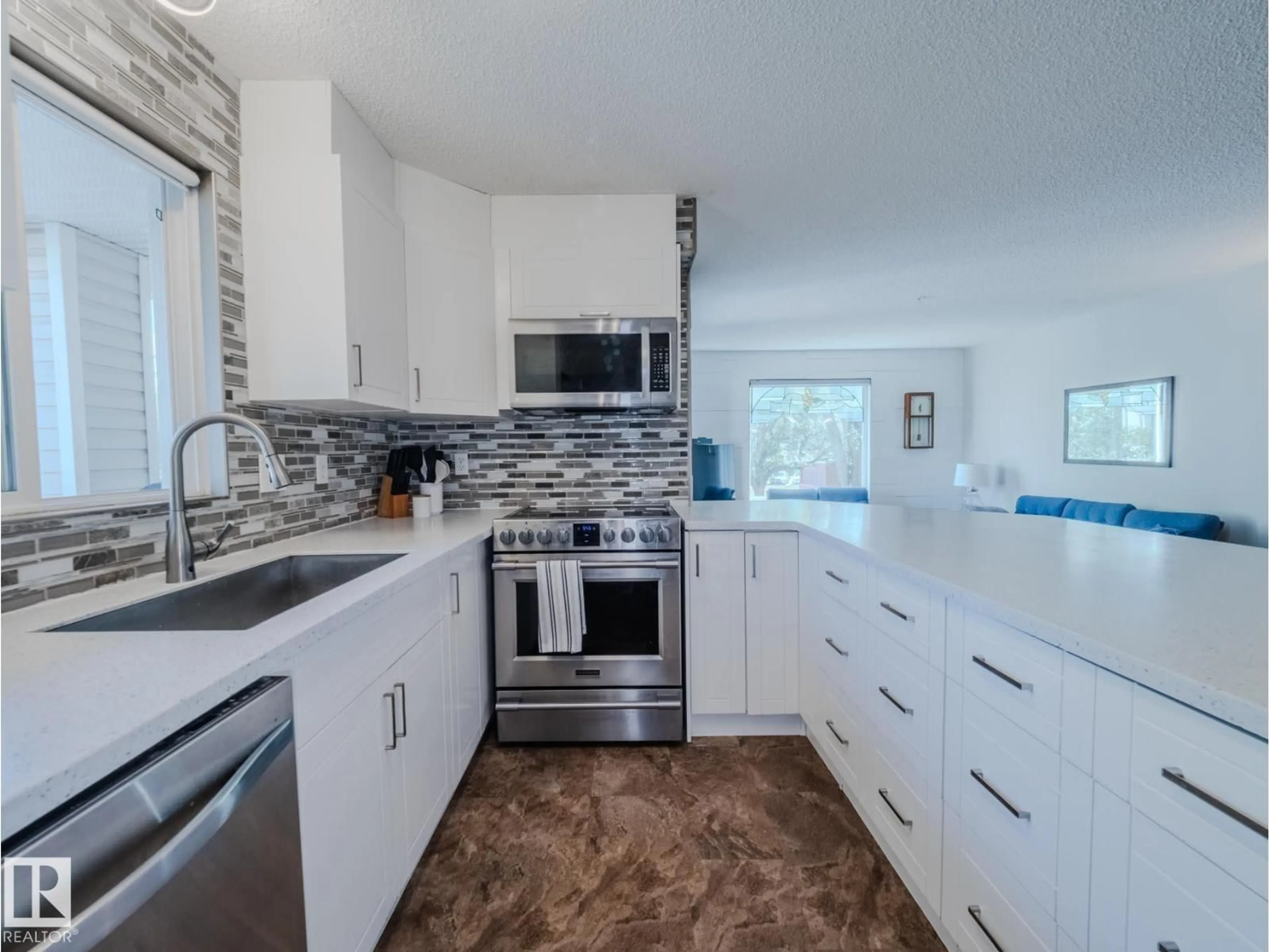 Open concept kitchen, ceramic/tile floor for 11214 NW - 2216 80 ST, Edmonton Alberta T5B4X5