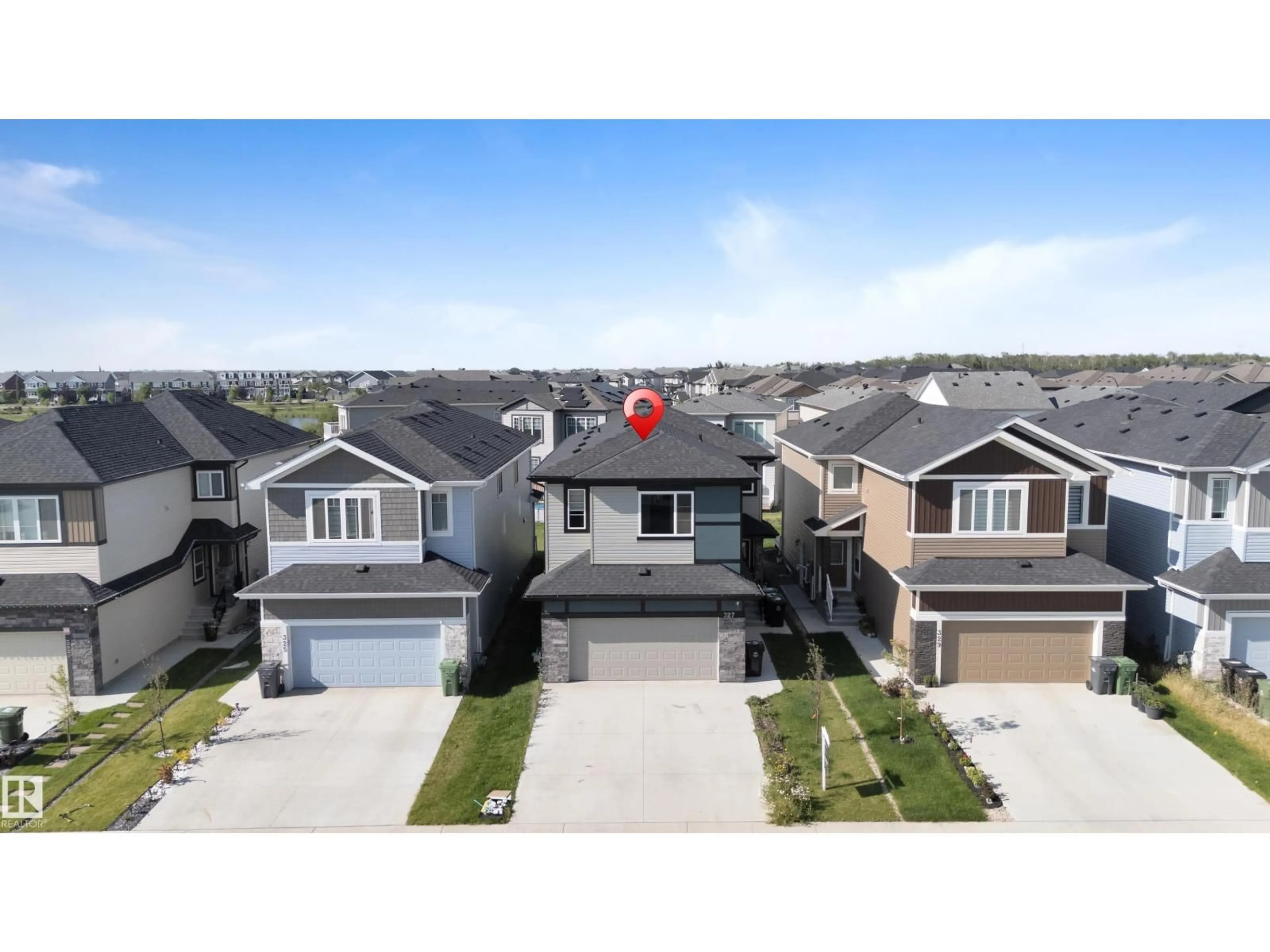 A pic from outside/outdoor area/front of a property/back of a property/a pic from drone, street for 327 ROBERTS WD, Leduc Alberta T9E1P9