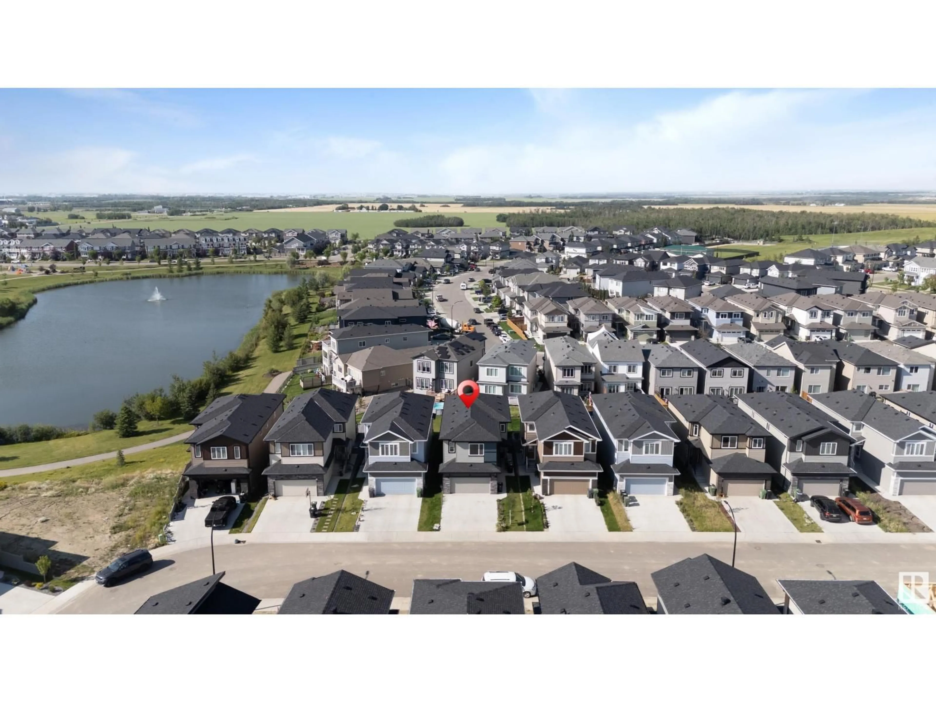 A pic from outside/outdoor area/front of a property/back of a property/a pic from drone, water/lake/river/ocean view for 327 ROBERTS WD, Leduc Alberta T9E1P9