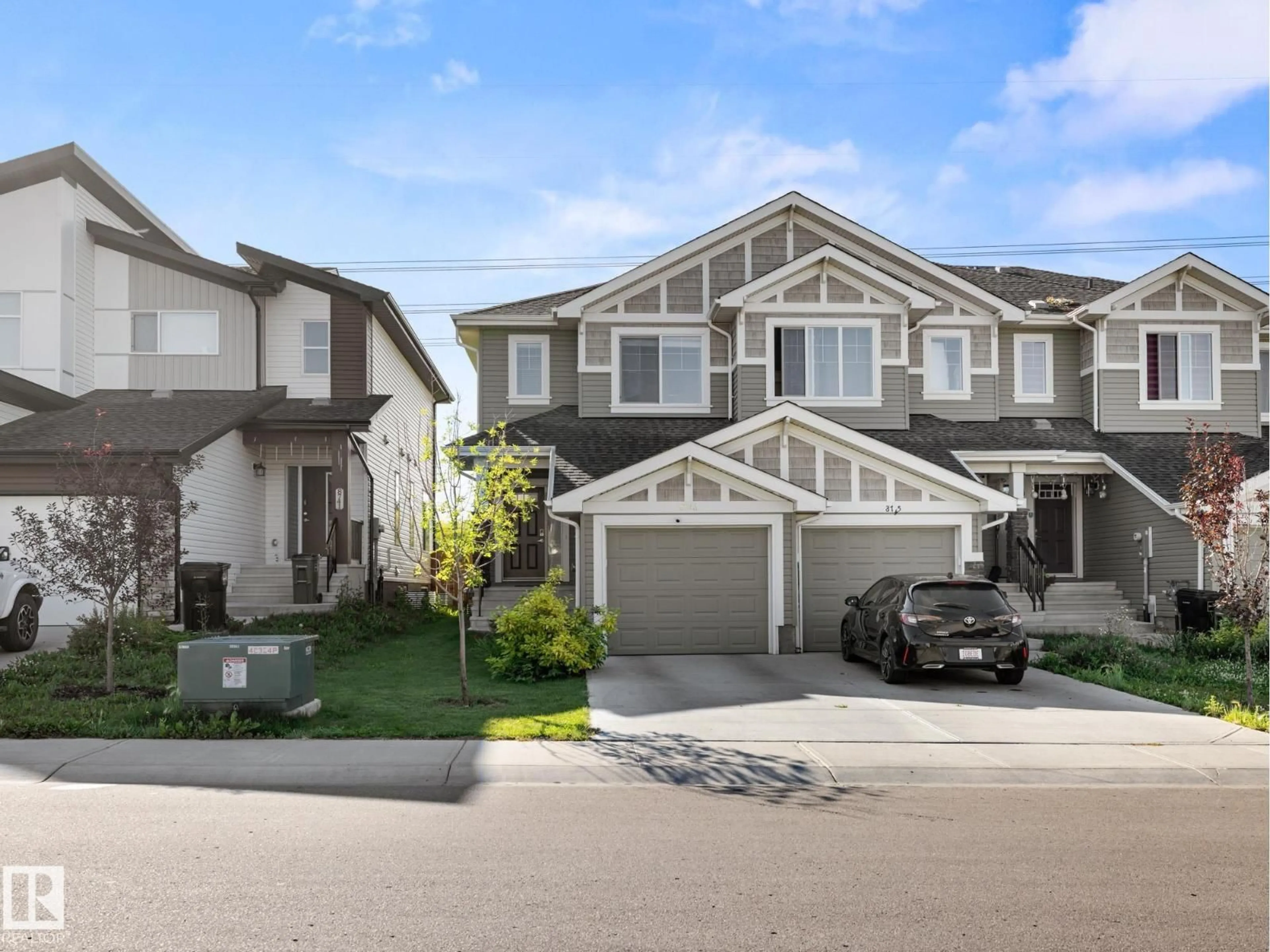 Home with vinyl exterior material, street for 8743 CARSON WY, Edmonton Alberta T6W4A6