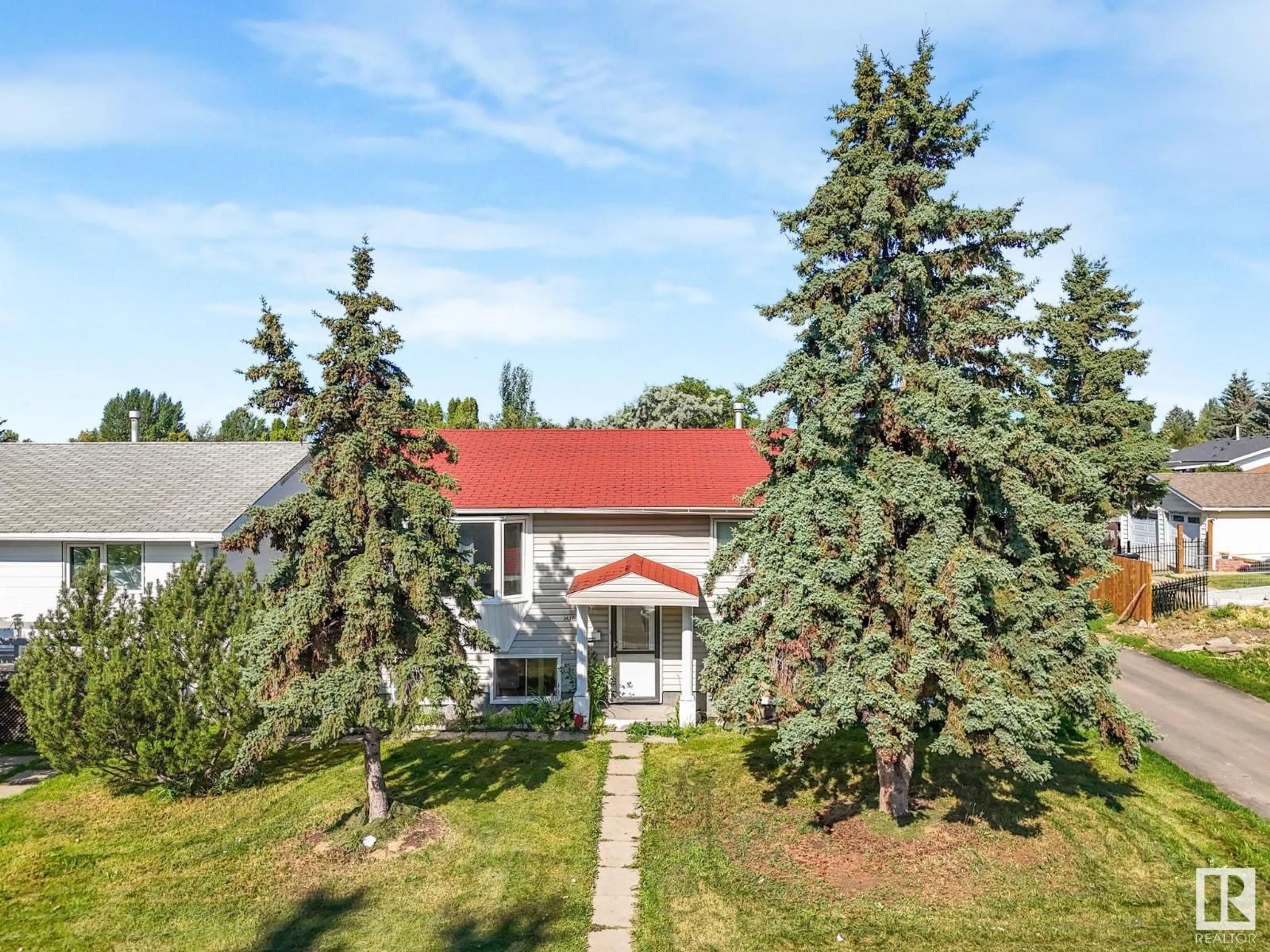A pic from outside/outdoor area/front of a property/back of a property/a pic from drone, unknown for NW - 3432 60 ST, Edmonton Alberta T6L1E2