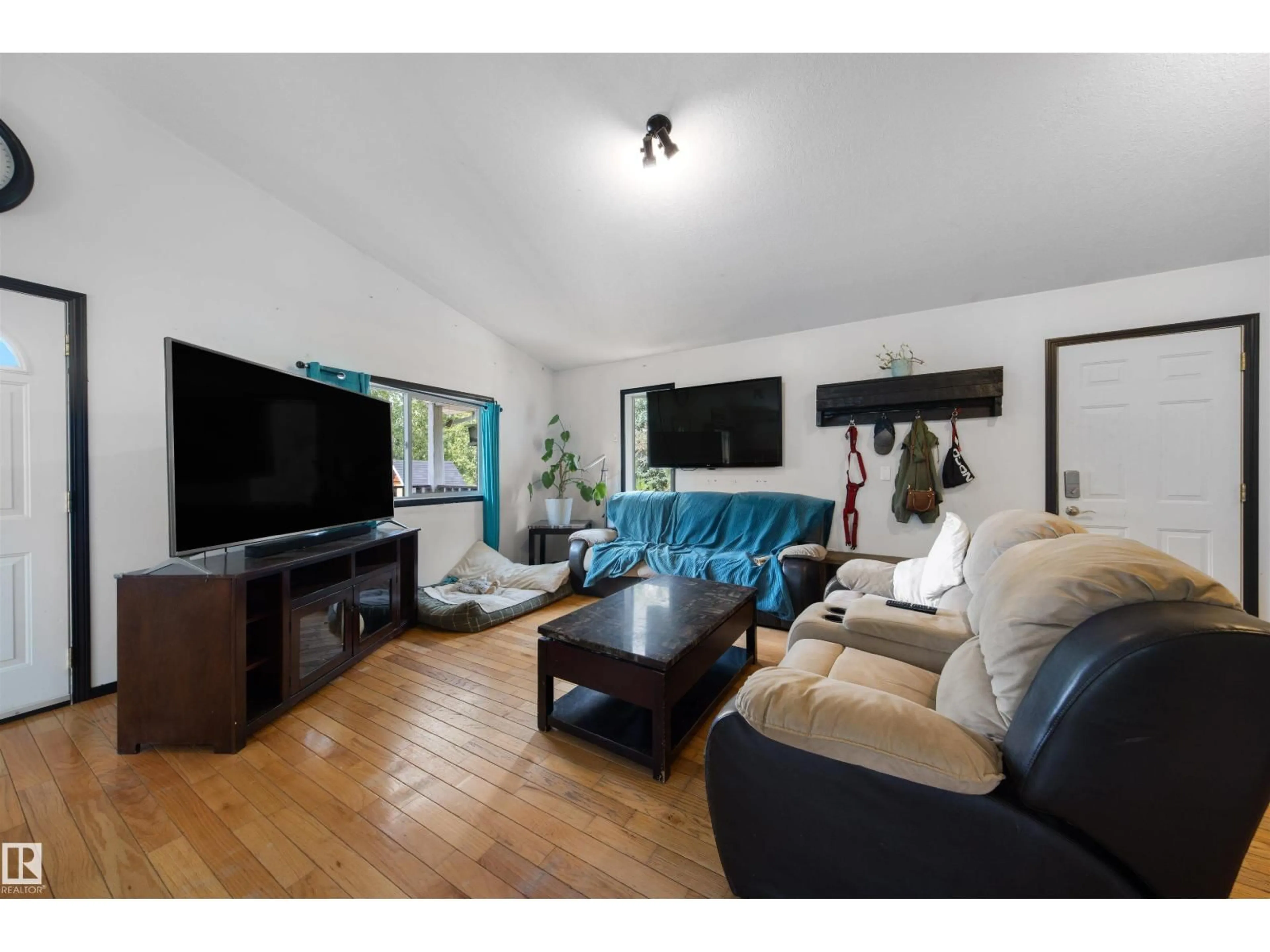Living room with furniture, wood/laminate floor for #11 - 6020 TWP ROAD 534, Rural Parkland County Alberta T0E0W0
