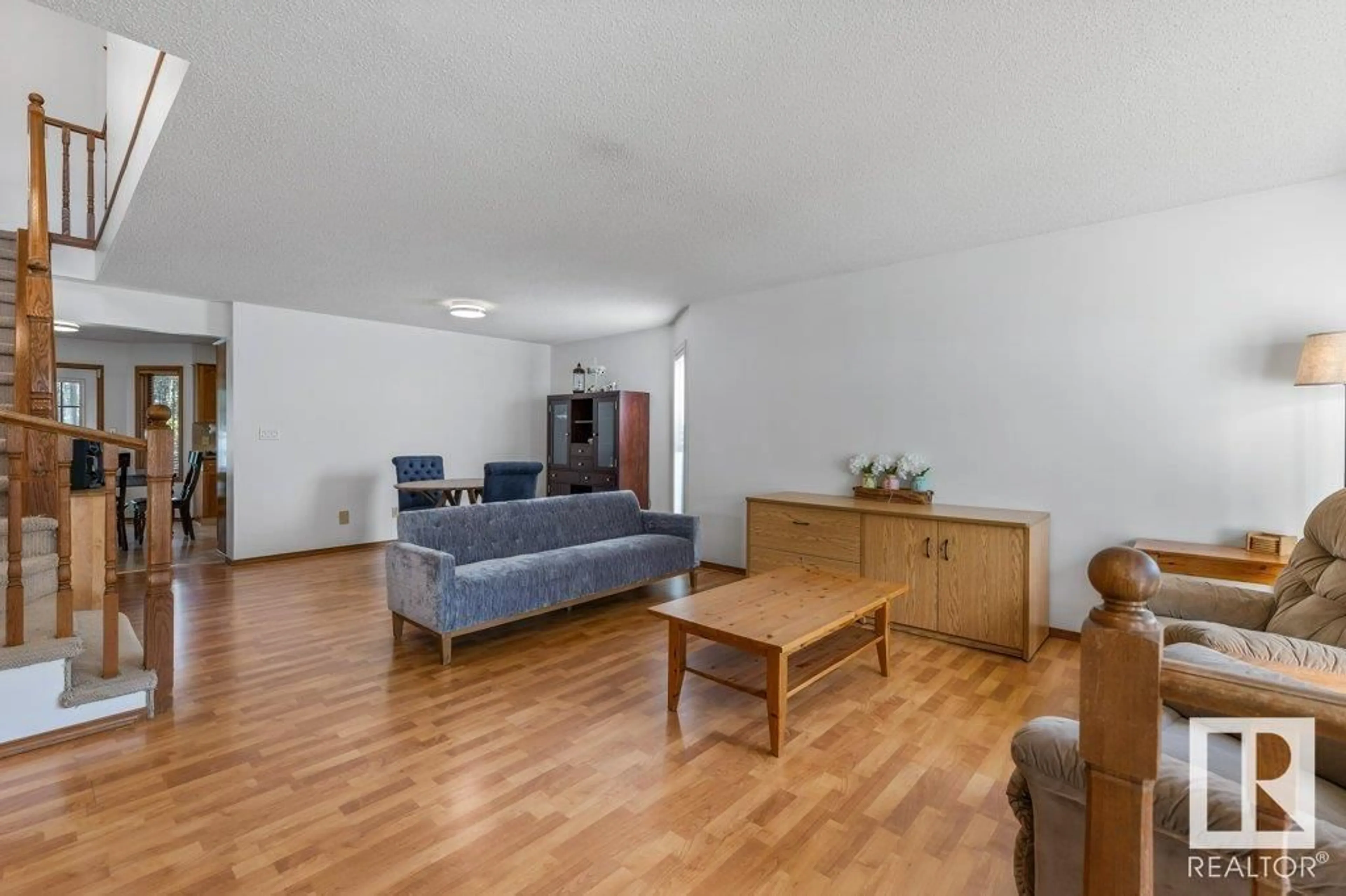 Living room with furniture, wood/laminate floor for 51 ALDERWOOD BLVD, St. Albert Alberta T8N3M4