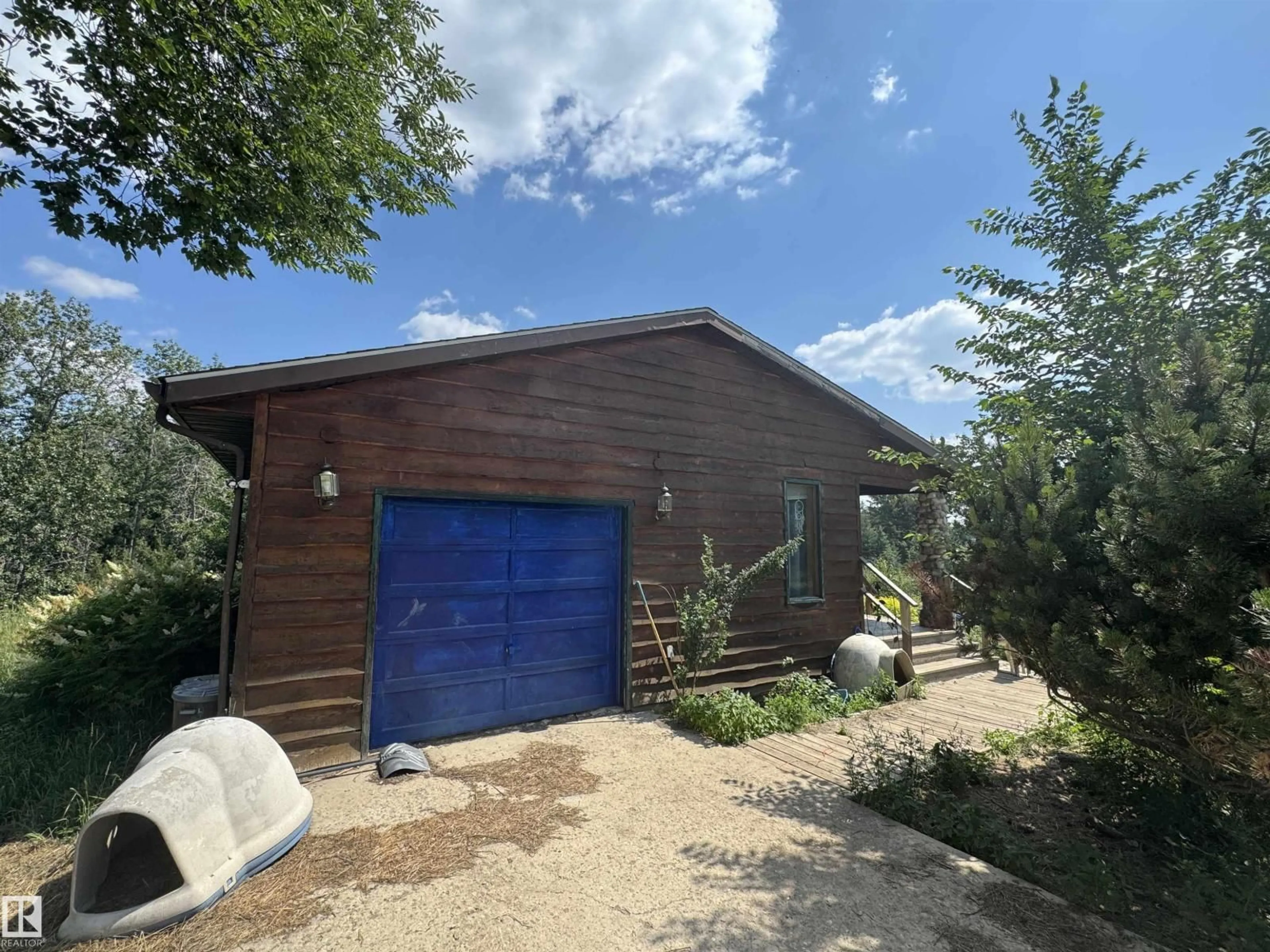 A pic from outside/outdoor area/front of a property/back of a property/a pic from drone, unknown for 57527A 41 HI, Rural St. Paul County Alberta T0A0B9
