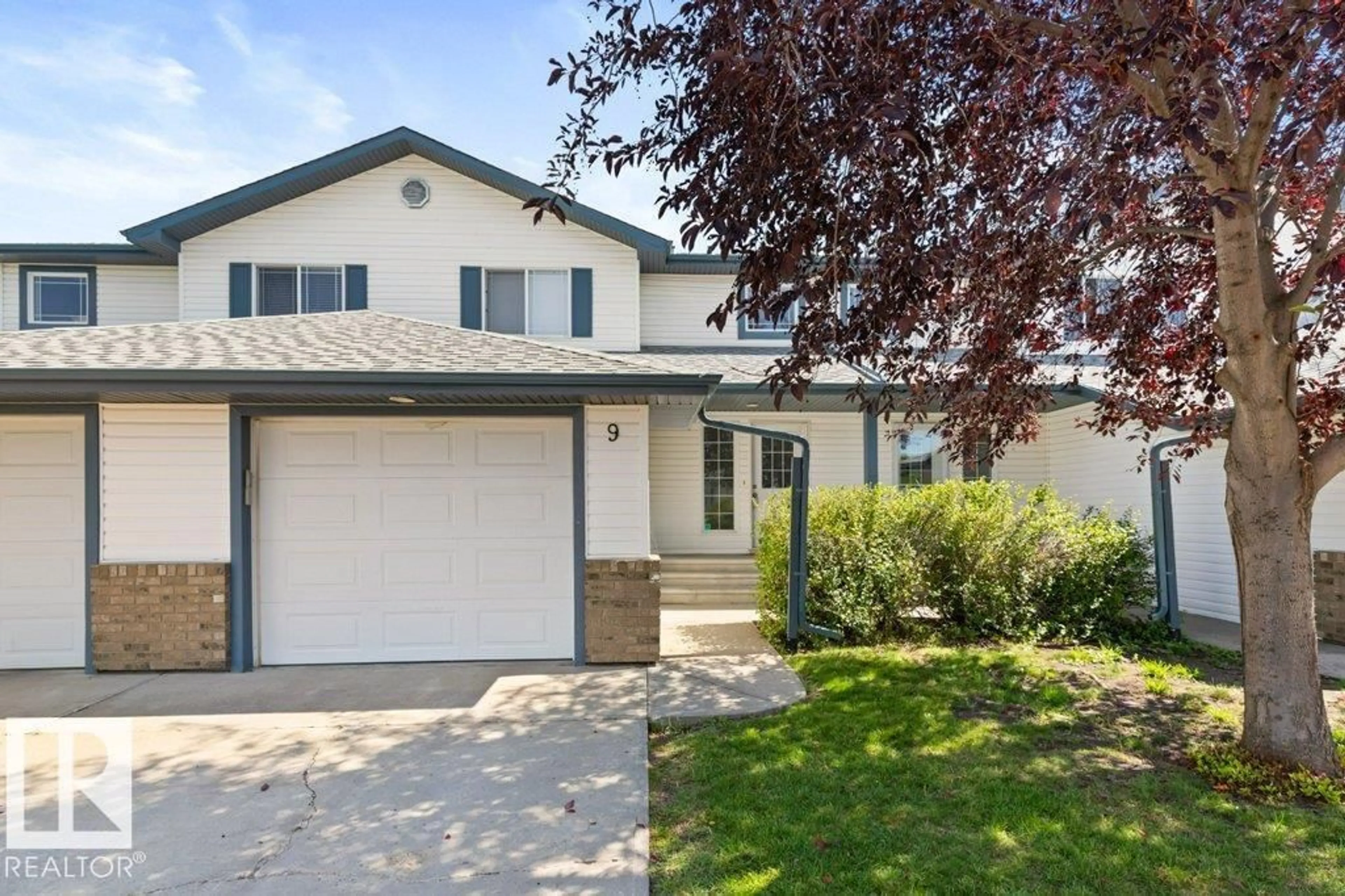 Home with vinyl exterior material, street for #9 - 450 HYNDMAN CR, Edmonton Alberta T5A0E2