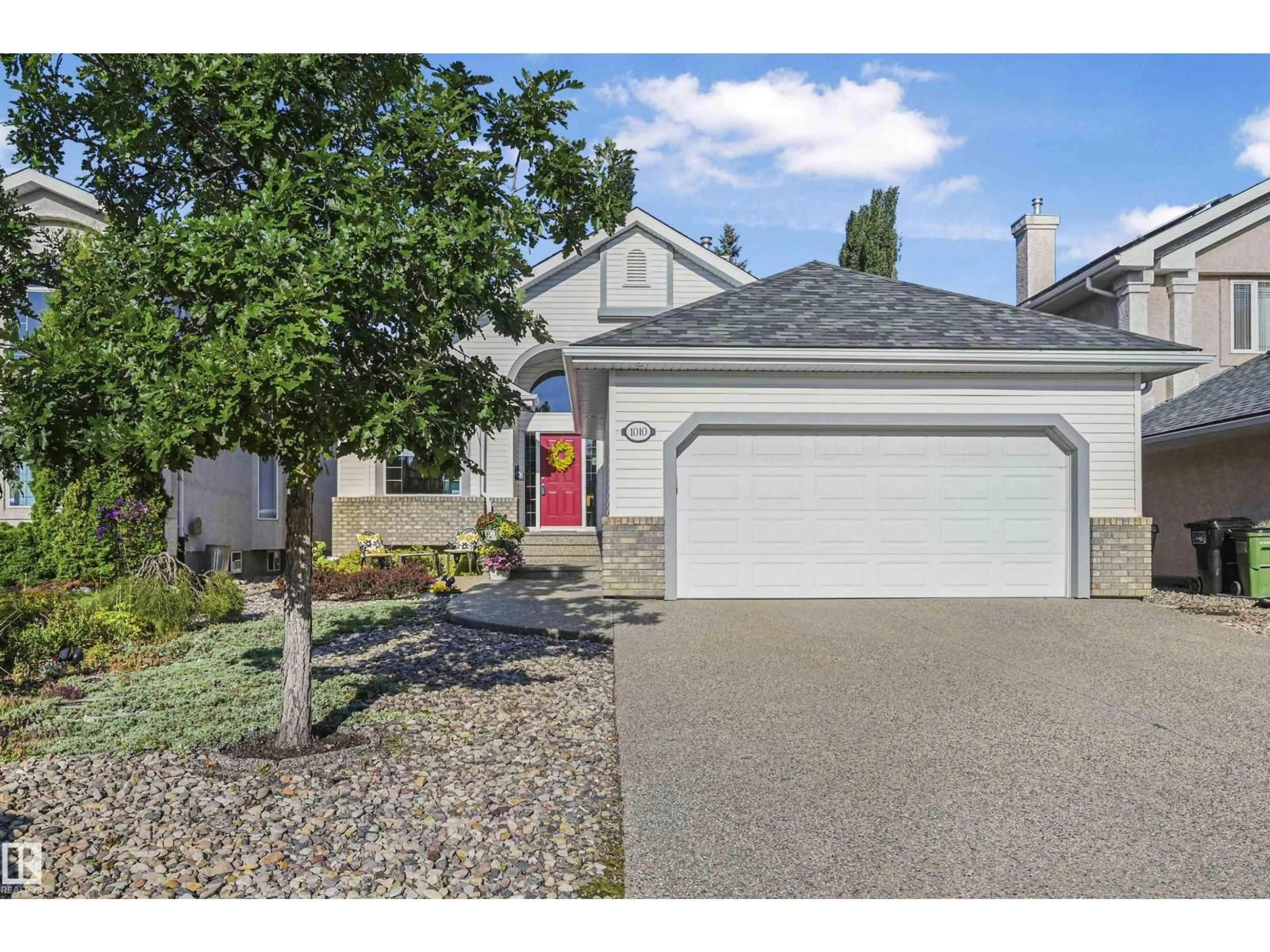Home with vinyl exterior material, street for 1010 HOLGATE PL, Edmonton Alberta T6R2T6