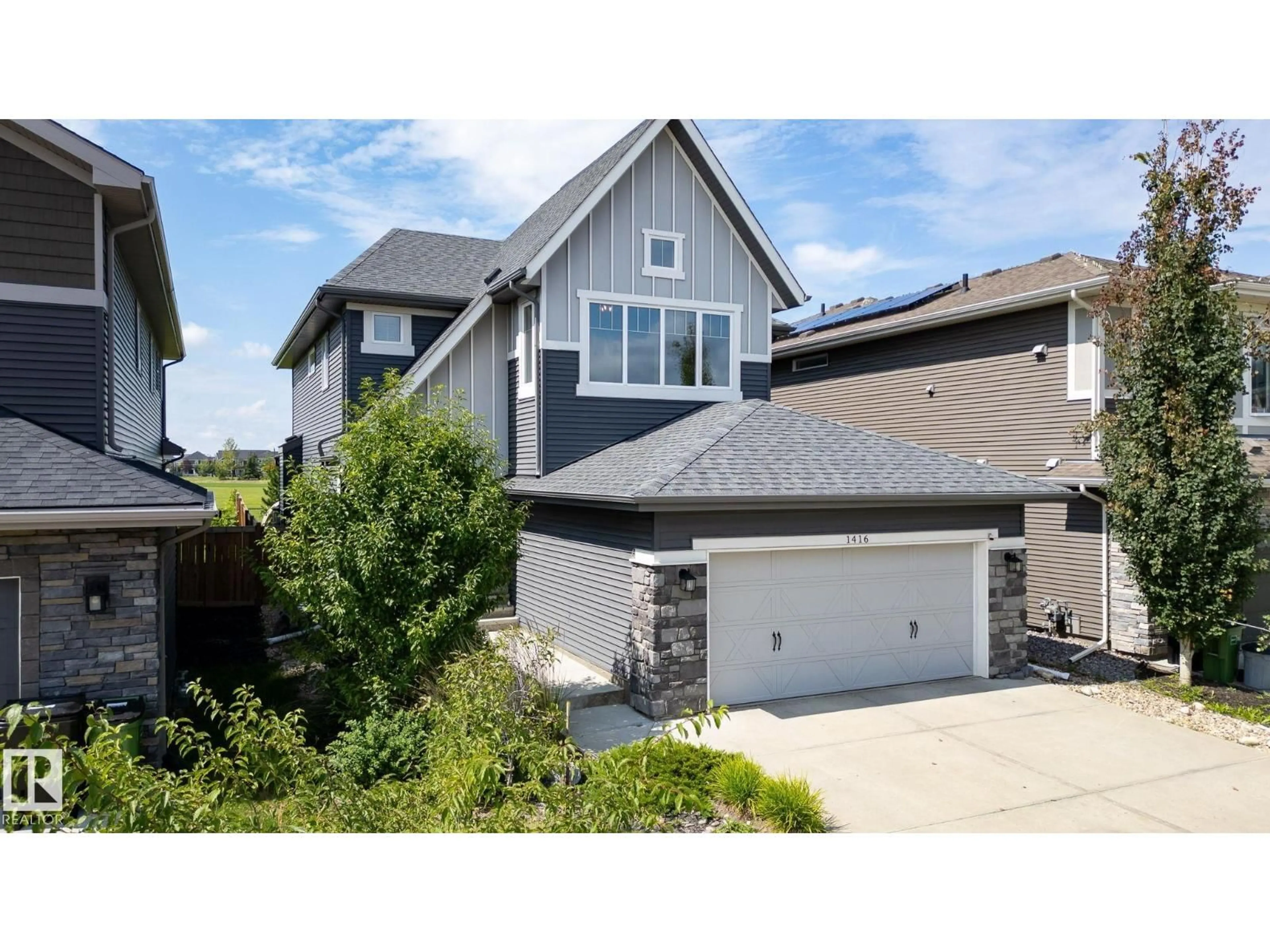 Home with brick exterior material, street for SW - 1416 161 ST, Edmonton Alberta T6W3P4