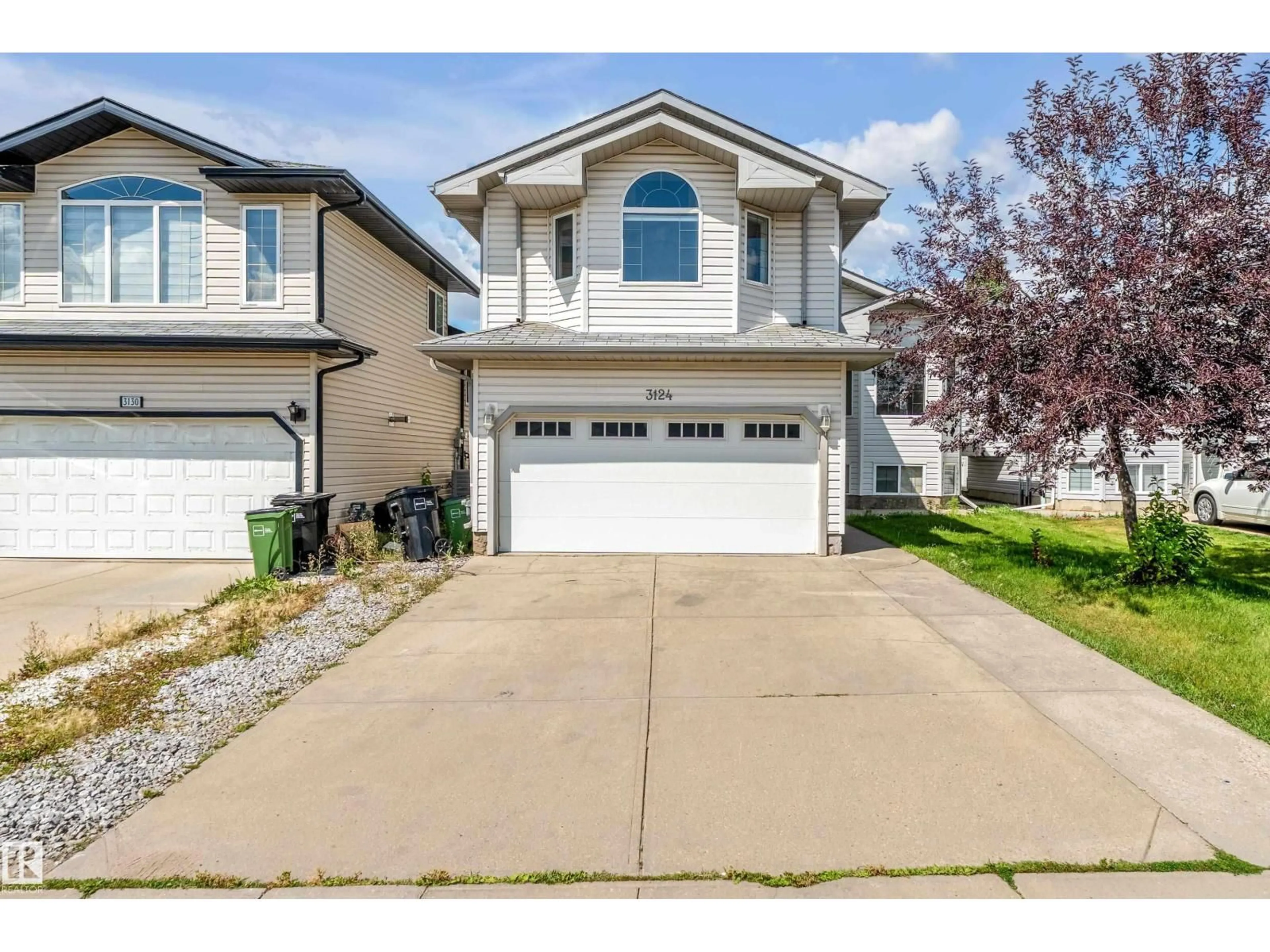 Home with vinyl exterior material, street for 3124 34A AV, Edmonton Alberta T6T1W5