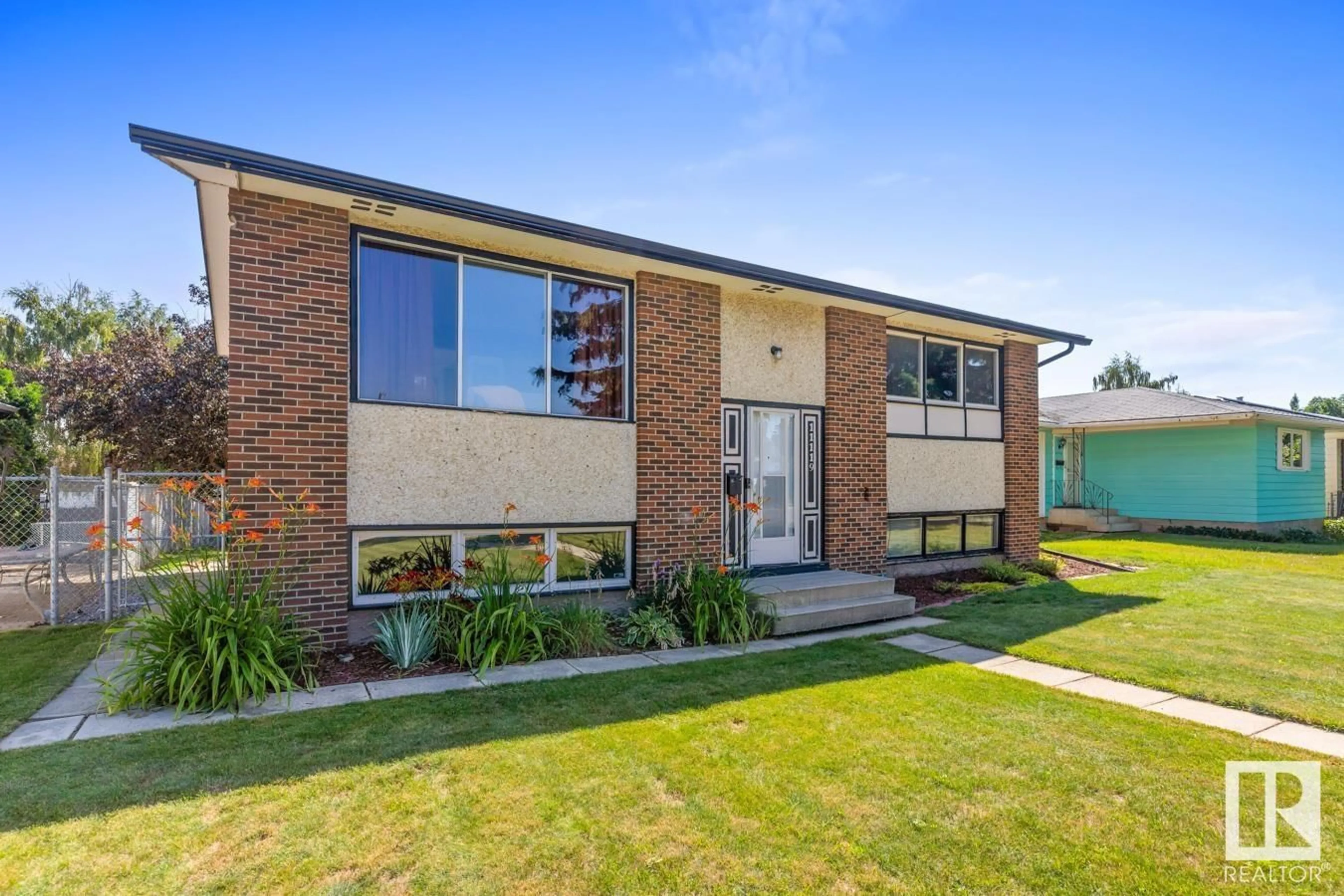 Home with brick exterior material, building for 11119 34 ST, Edmonton Alberta T5W1Y8