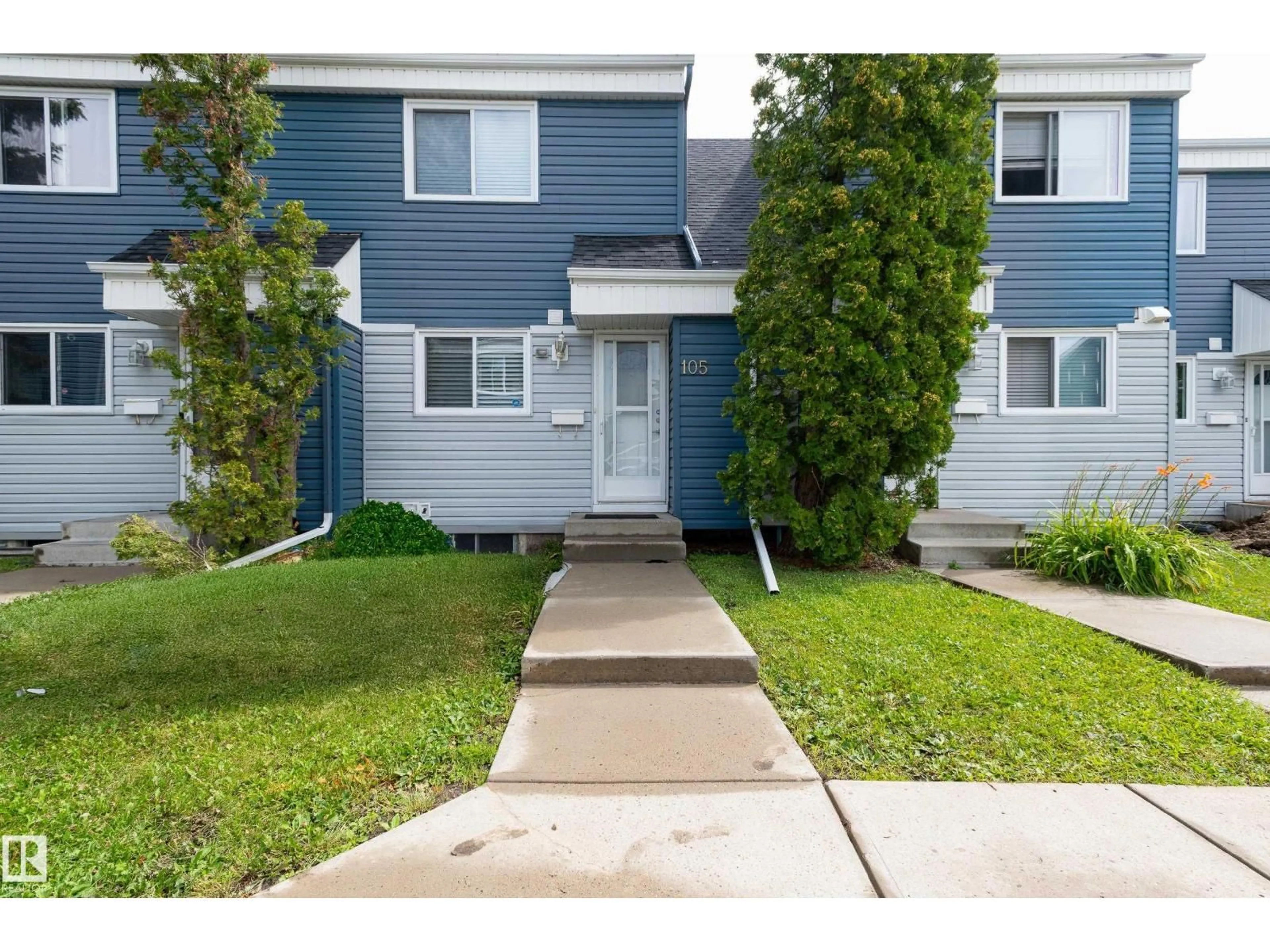 Home with vinyl exterior material, street for #105 - 14707 53 AV, Edmonton Alberta T6H5C9