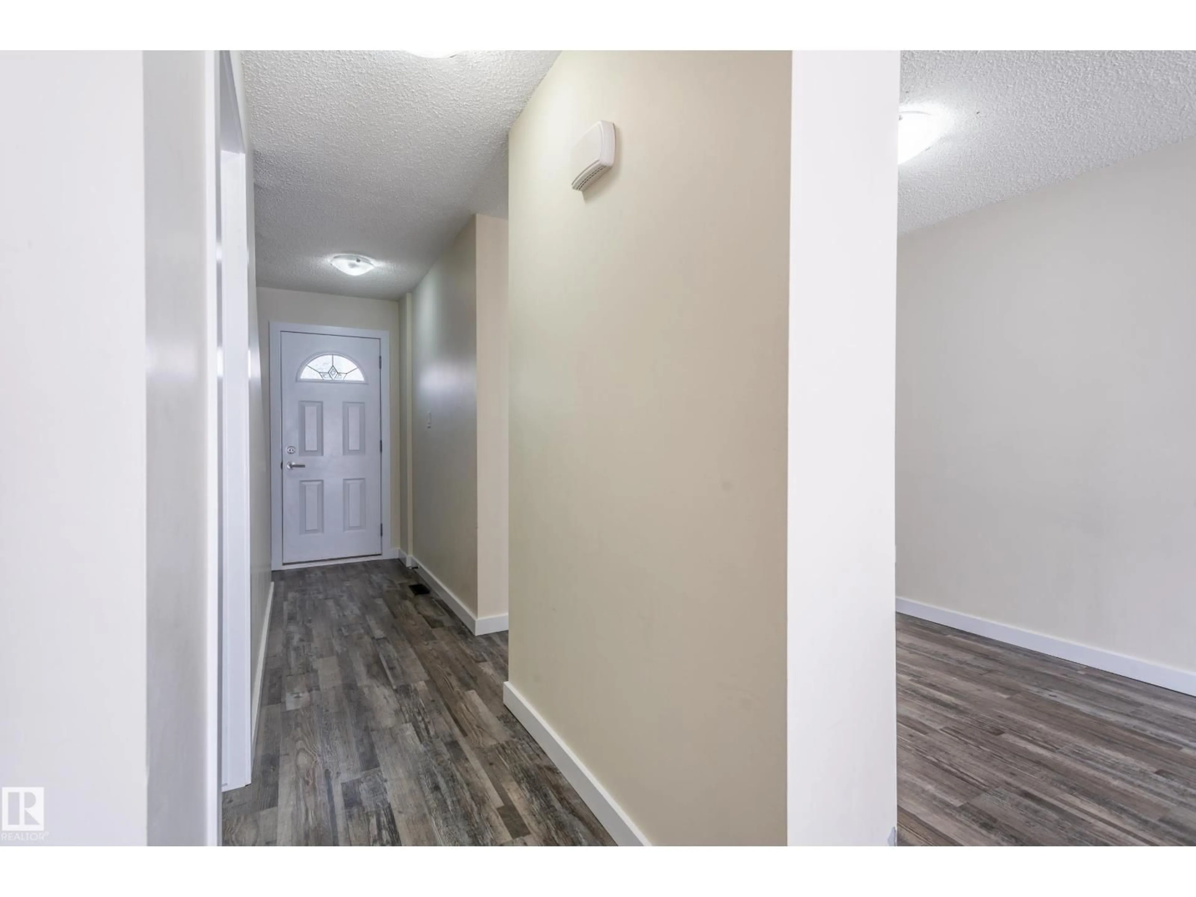 Indoor entryway for #105 - 14707 53 AV, Edmonton Alberta T6H5C9