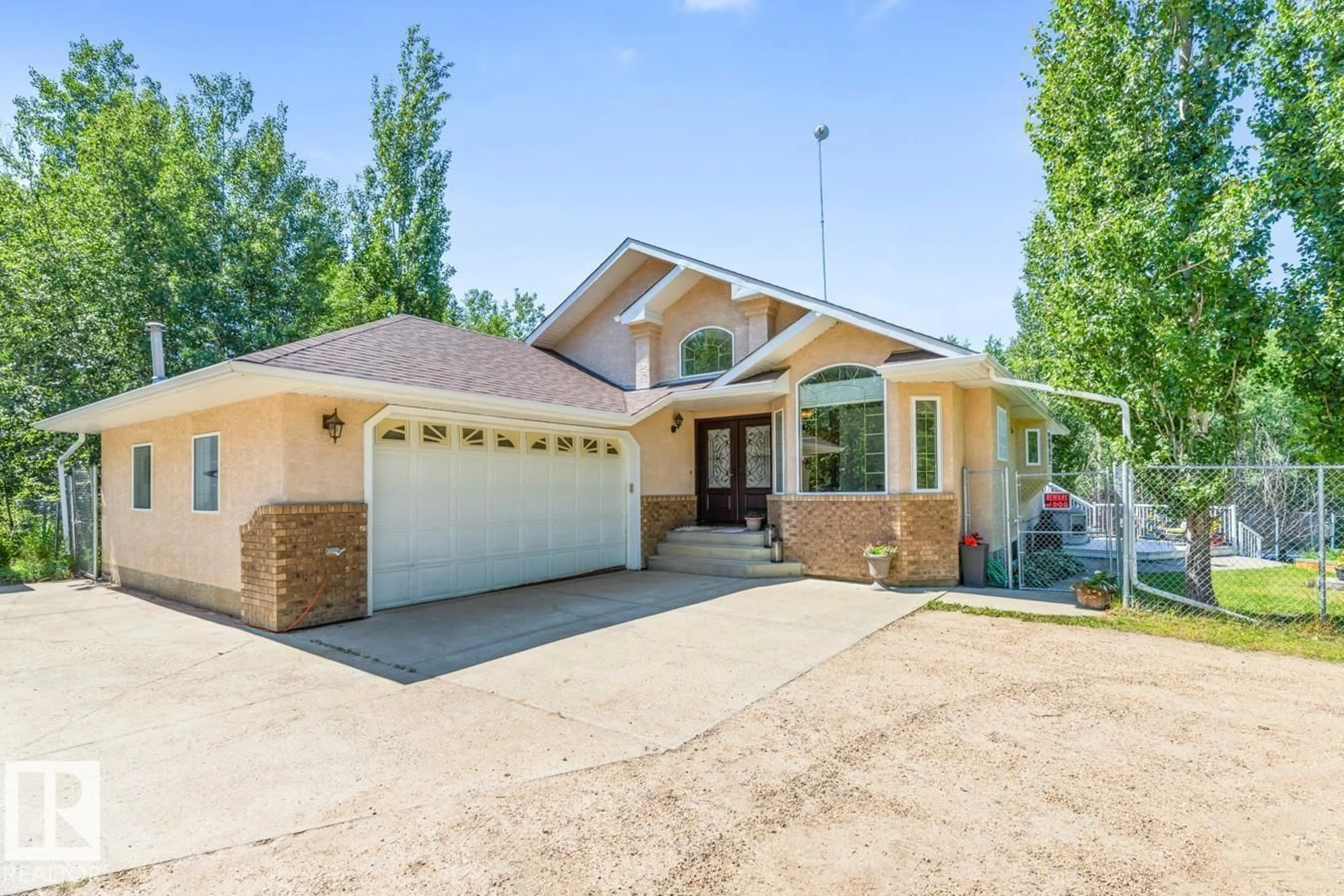 Home with brick exterior material, street for 51110 - 133 RGE ROAD 214 RGE ROAD, Rural Strathcona County Alberta T8E1G7