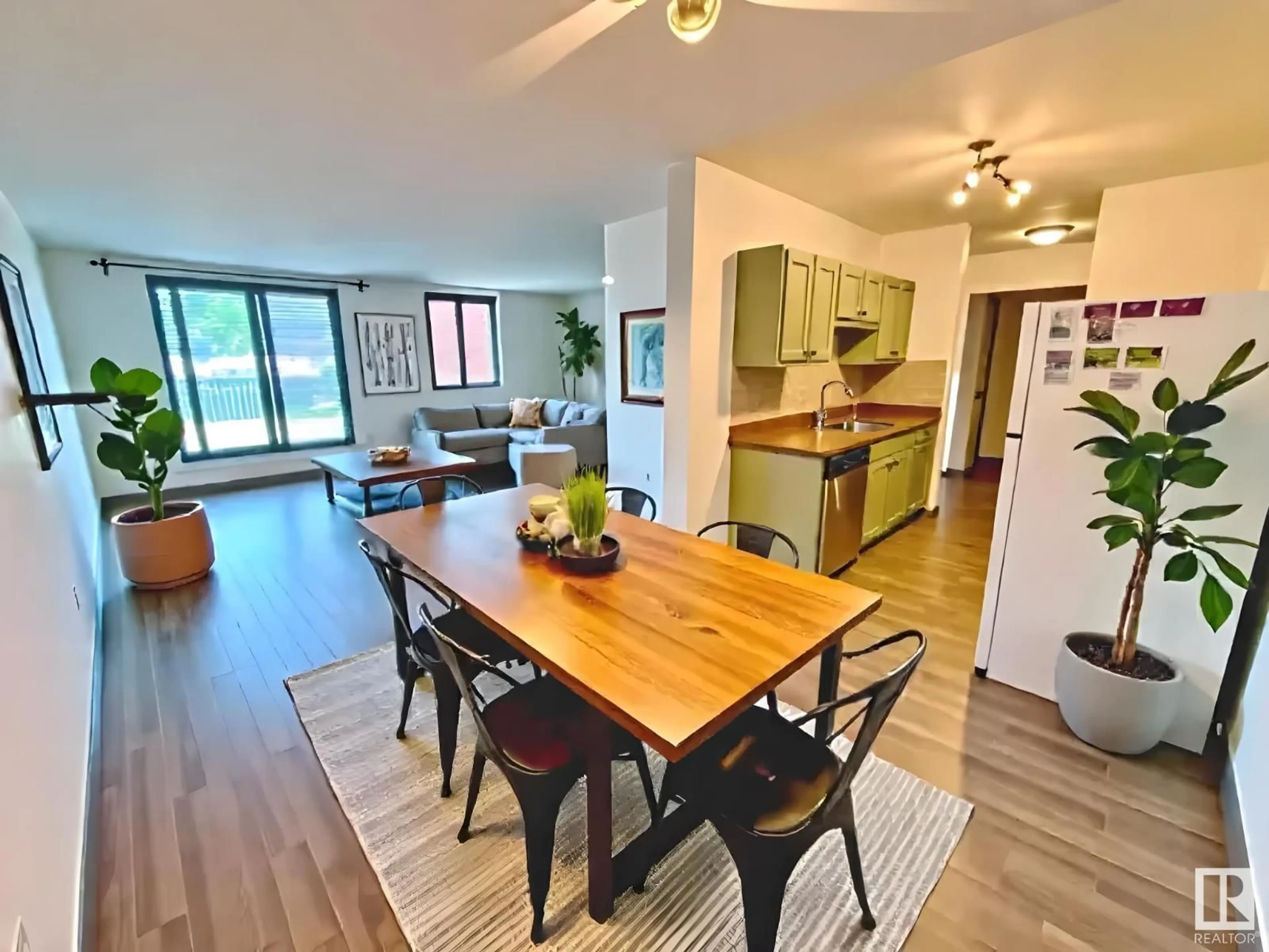Open concept kitchen, wood/laminate floor for #409 - 10145 109 ST, Edmonton Alberta T5J3M5