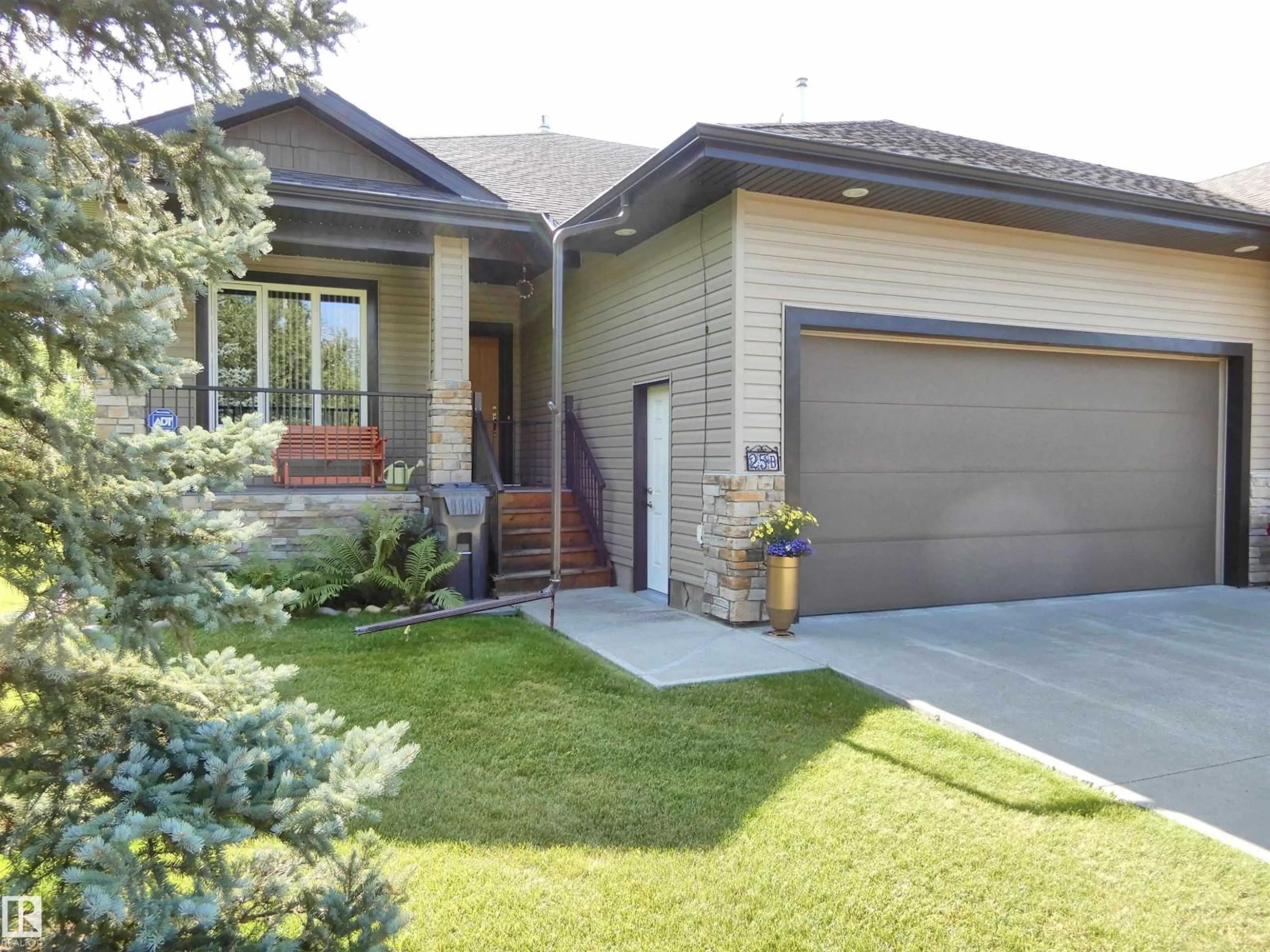 Home with brick exterior material, street for 25B RGE ROAD 272 RGE ROAD, Rural Parkland County Alberta T7X3M5