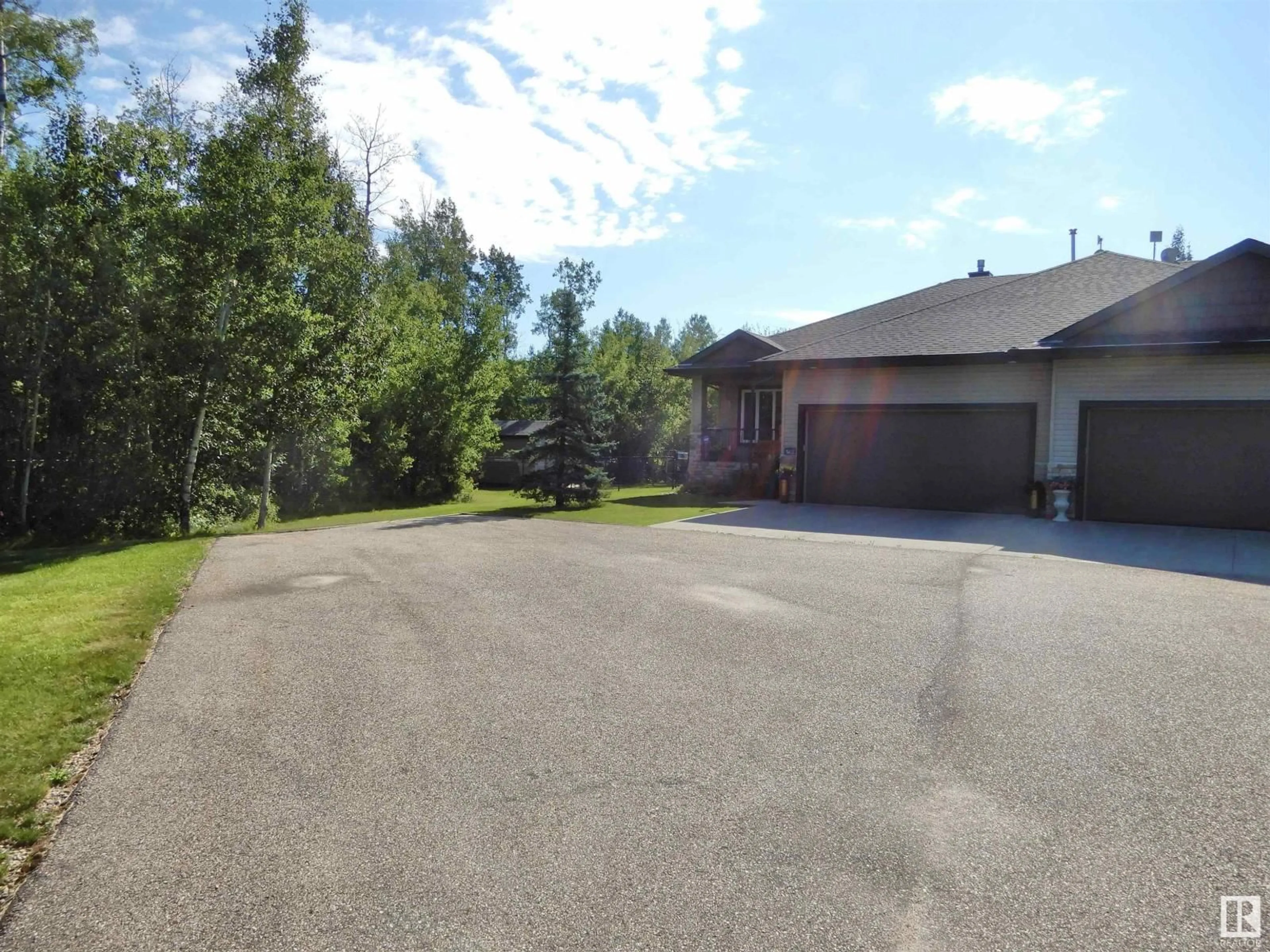 A pic from outside/outdoor area/front of a property/back of a property/a pic from drone, unknown for 25B RGE ROAD 272 RGE ROAD, Rural Parkland County Alberta T7X3M5