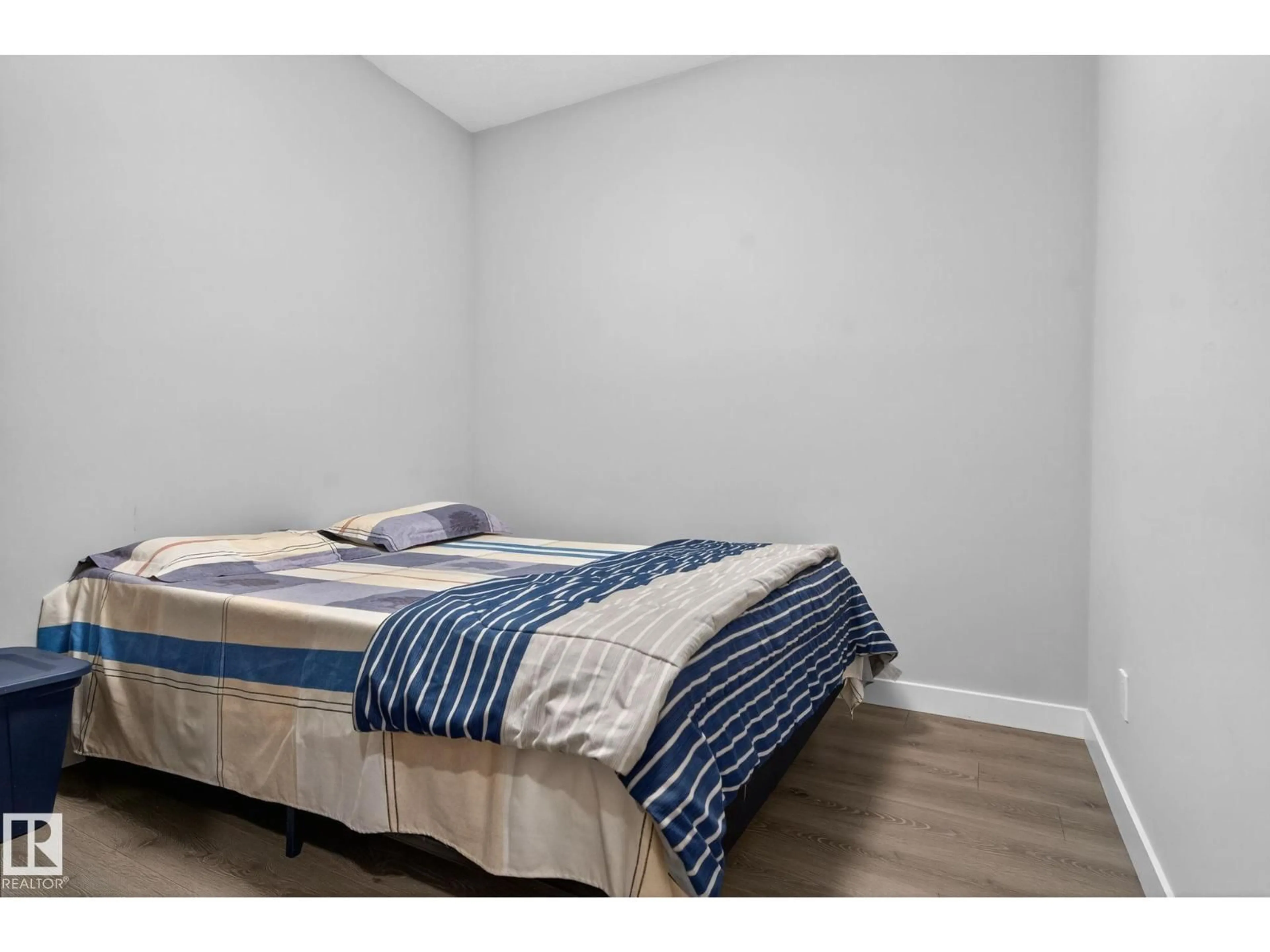 Bedroom with bed, wood/laminate floor for 22035 80 AV, Edmonton Alberta T5T7R6