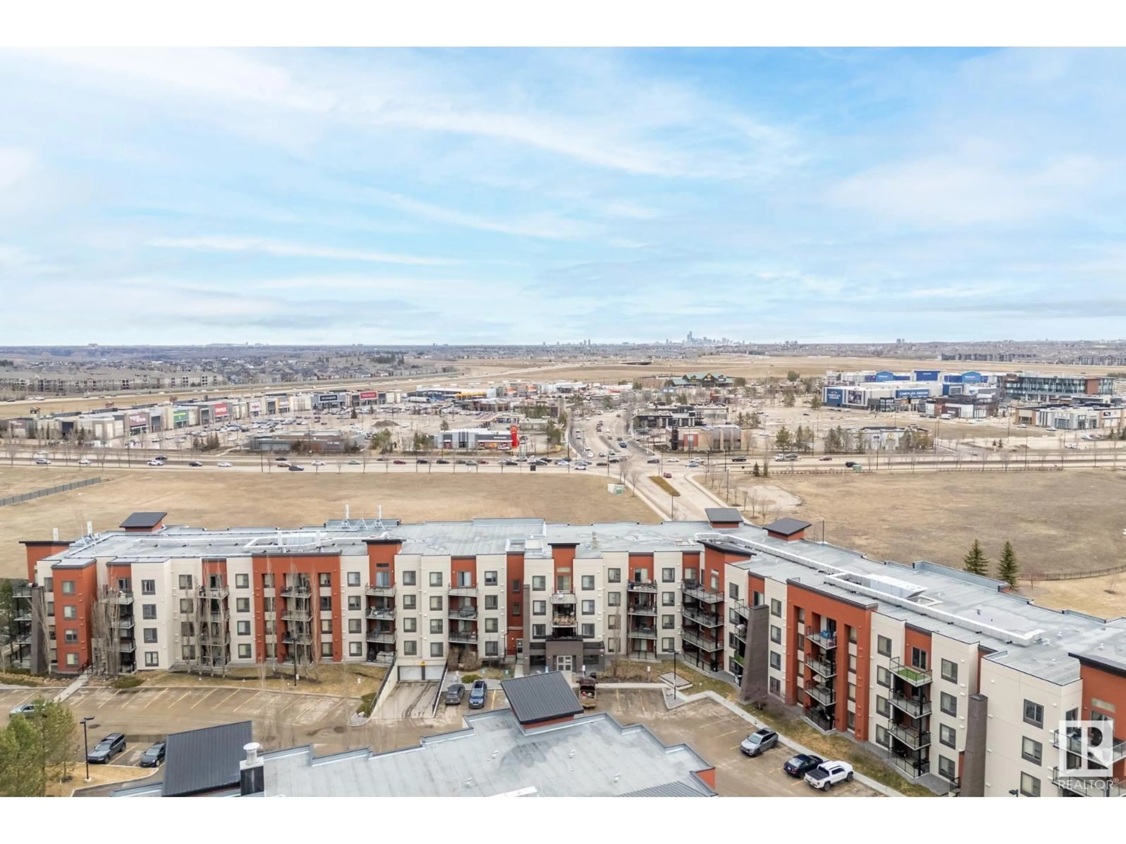 A pic from outside/outdoor area/front of a property/back of a property/a pic from drone, city buildings view from balcony for 224 - 304 AMBLESIDE LI, Edmonton Alberta T6W0V2