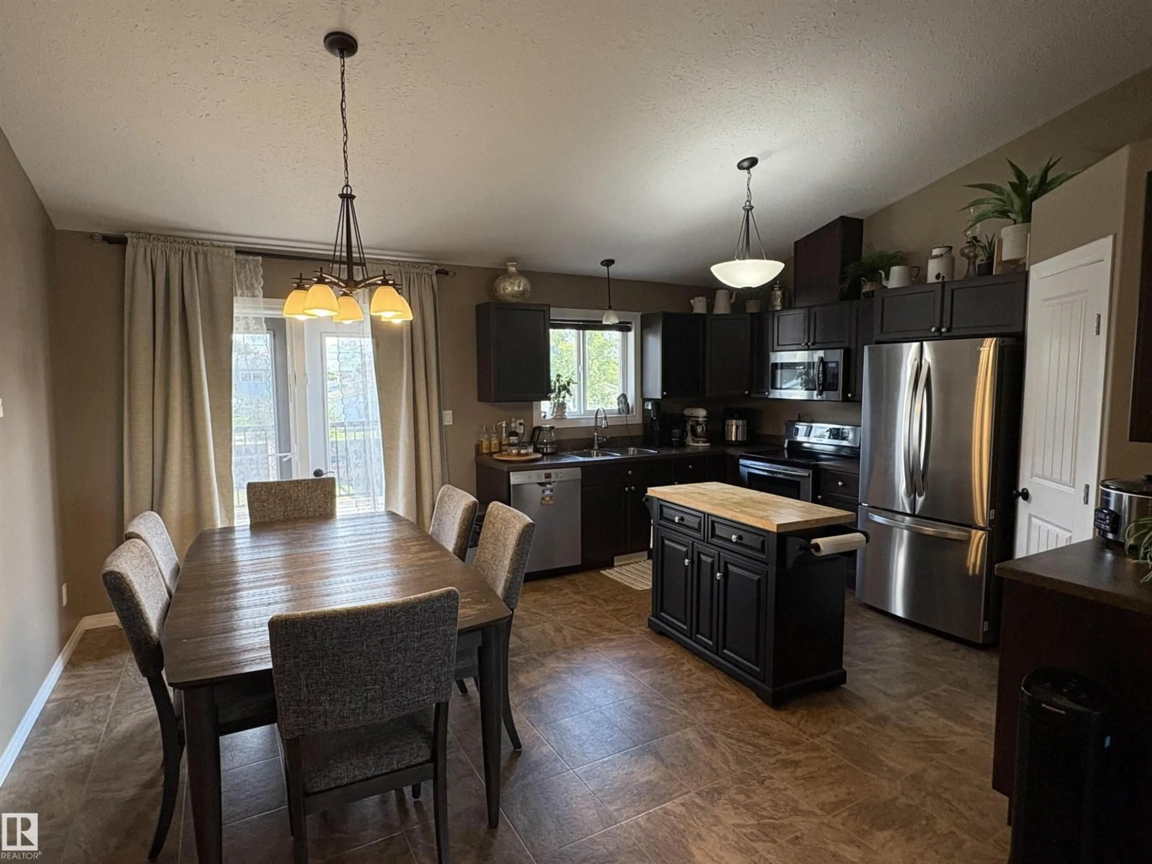 Open concept kitchen, wood/laminate floor for 4437 53 AV, St. Paul Town Alberta T0A3A3