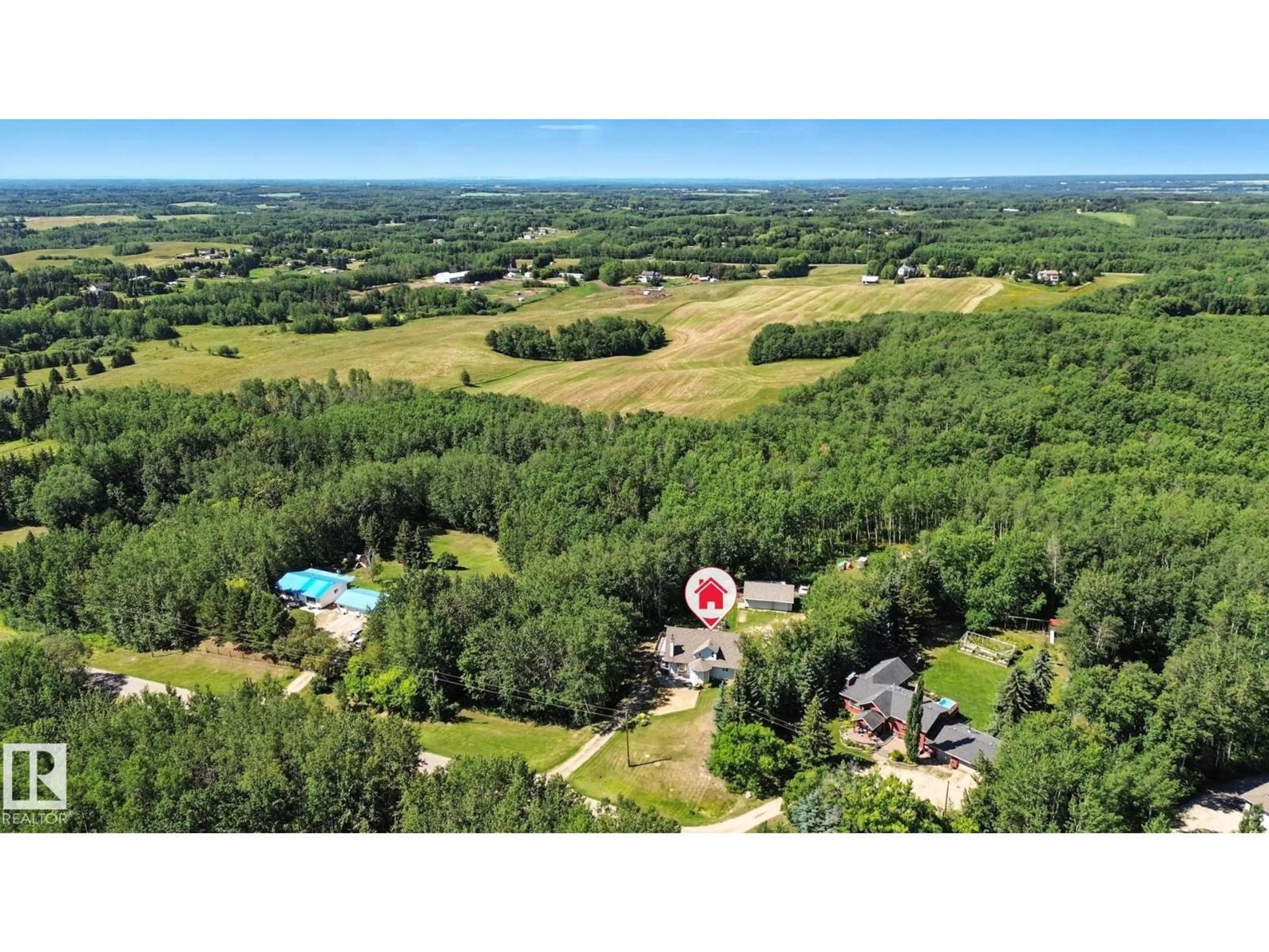 A pic from outside/outdoor area/front of a property/back of a property/a pic from drone, forest/trees view for 18 - 1316 TWP ROAD 533, Rural Parkland County Alberta T7Y0G2