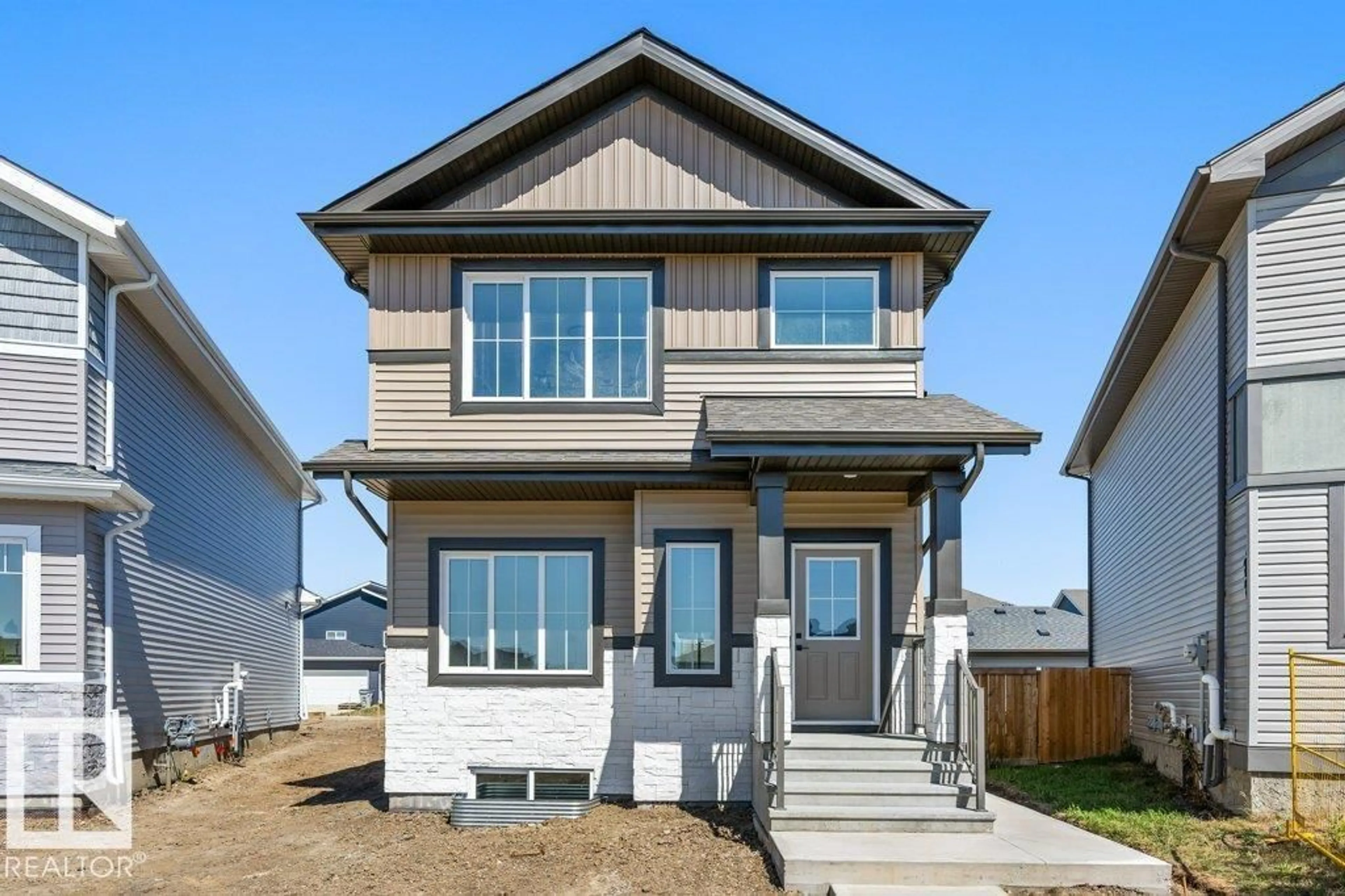 Home with vinyl exterior material, street for 10625 99 ST, Morinville Alberta T8R2P1