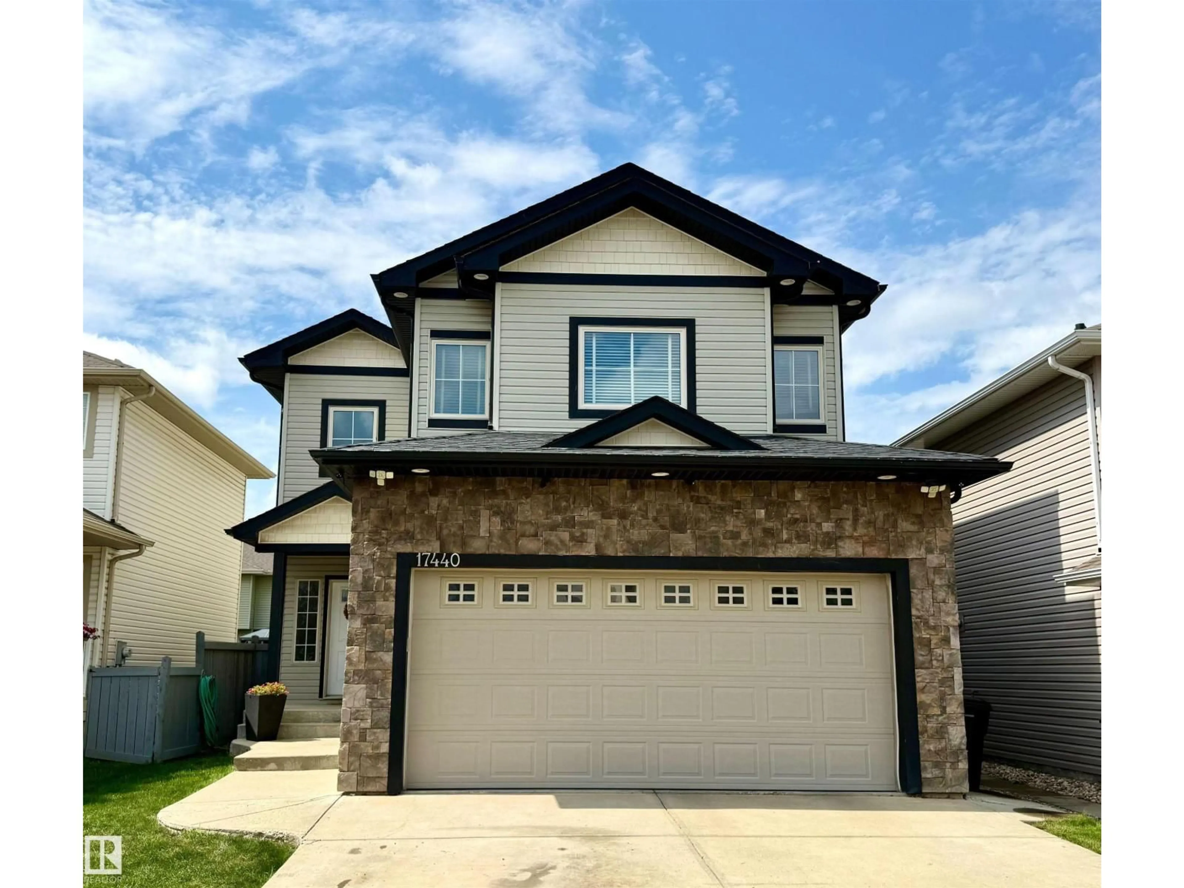 Home with vinyl exterior material, street for 17440 119 ST, Edmonton Alberta T5X0A6